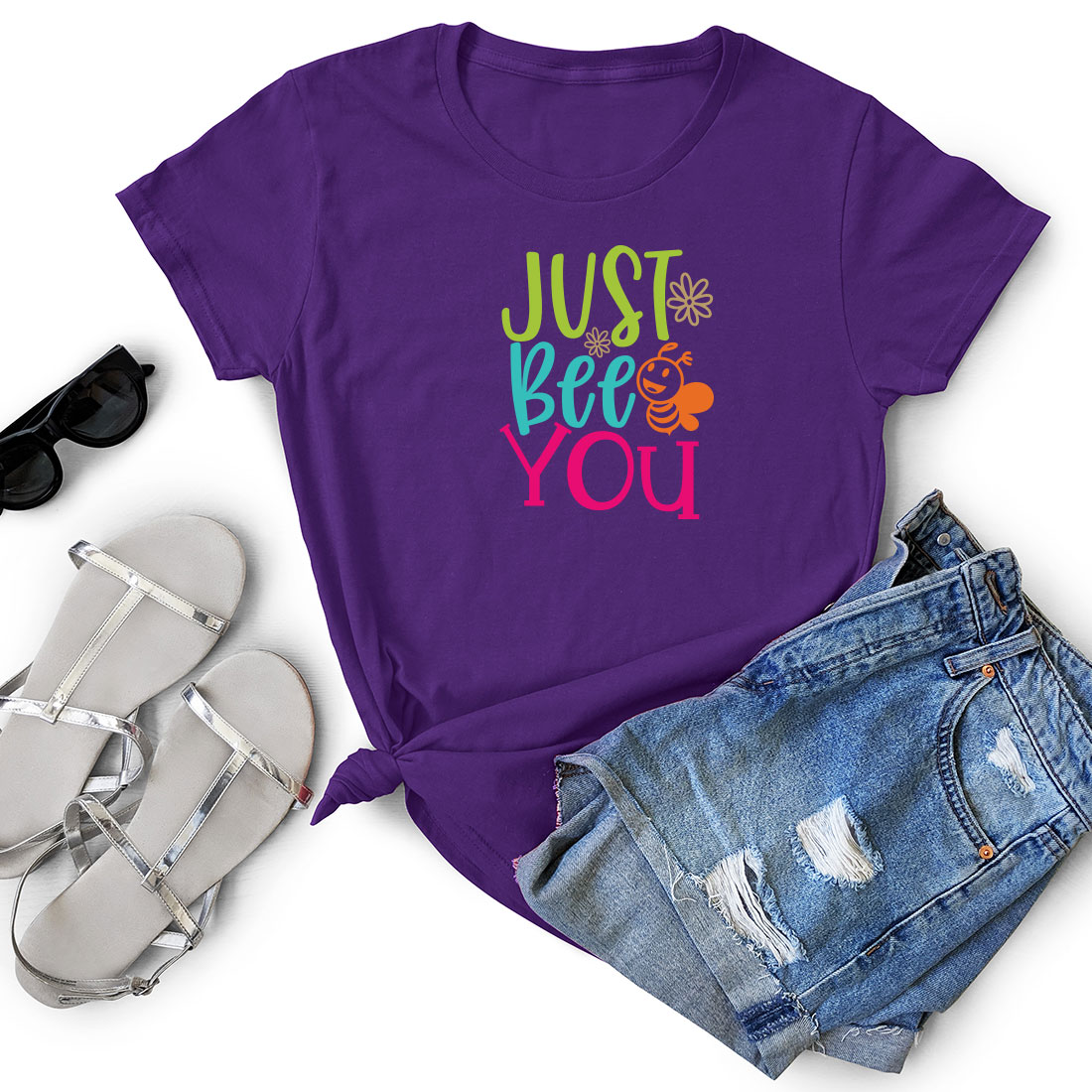 T - shirt that says just bee you next to a pair of shorts.