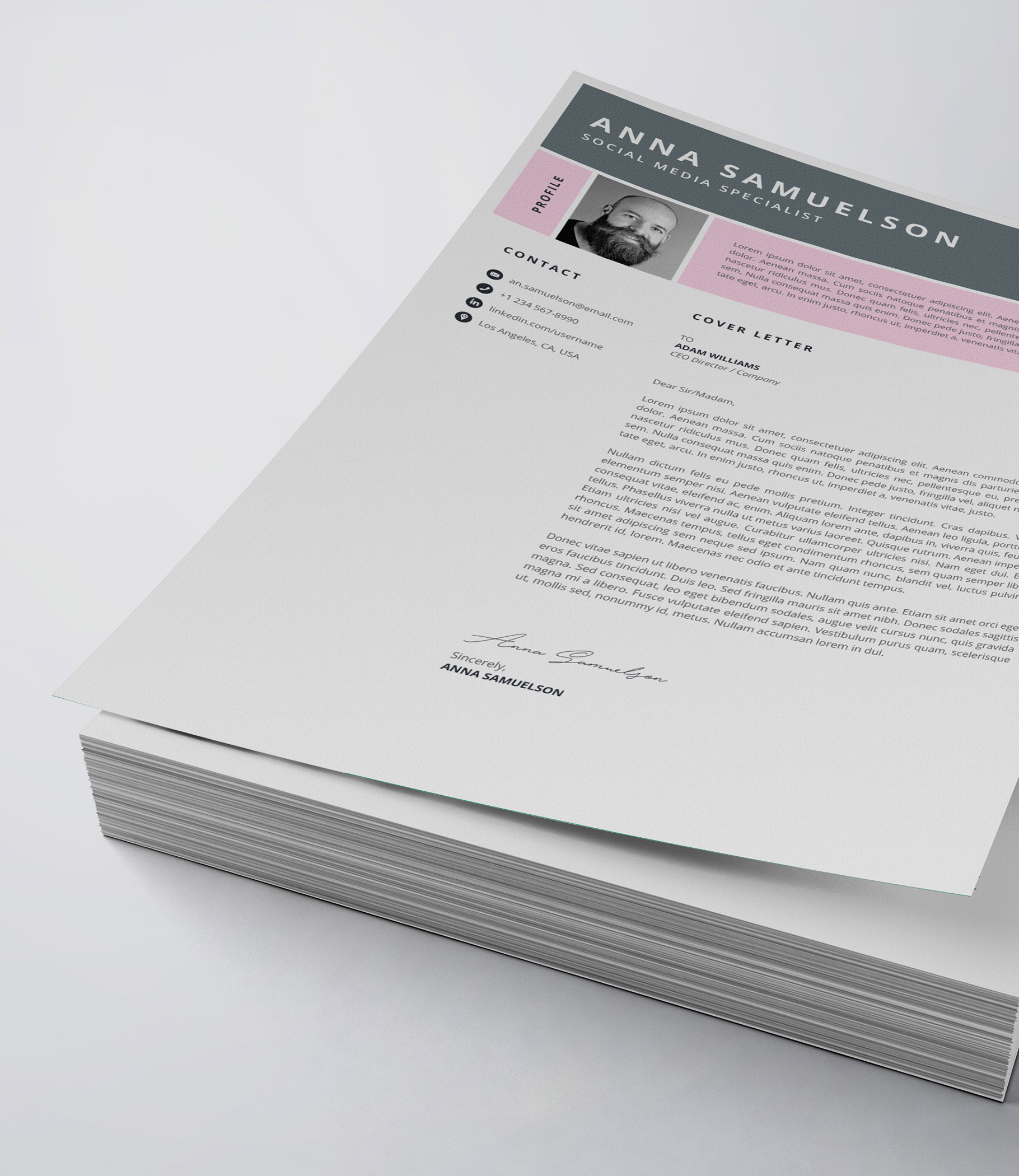 White and pink resume on top of a stack of papers.