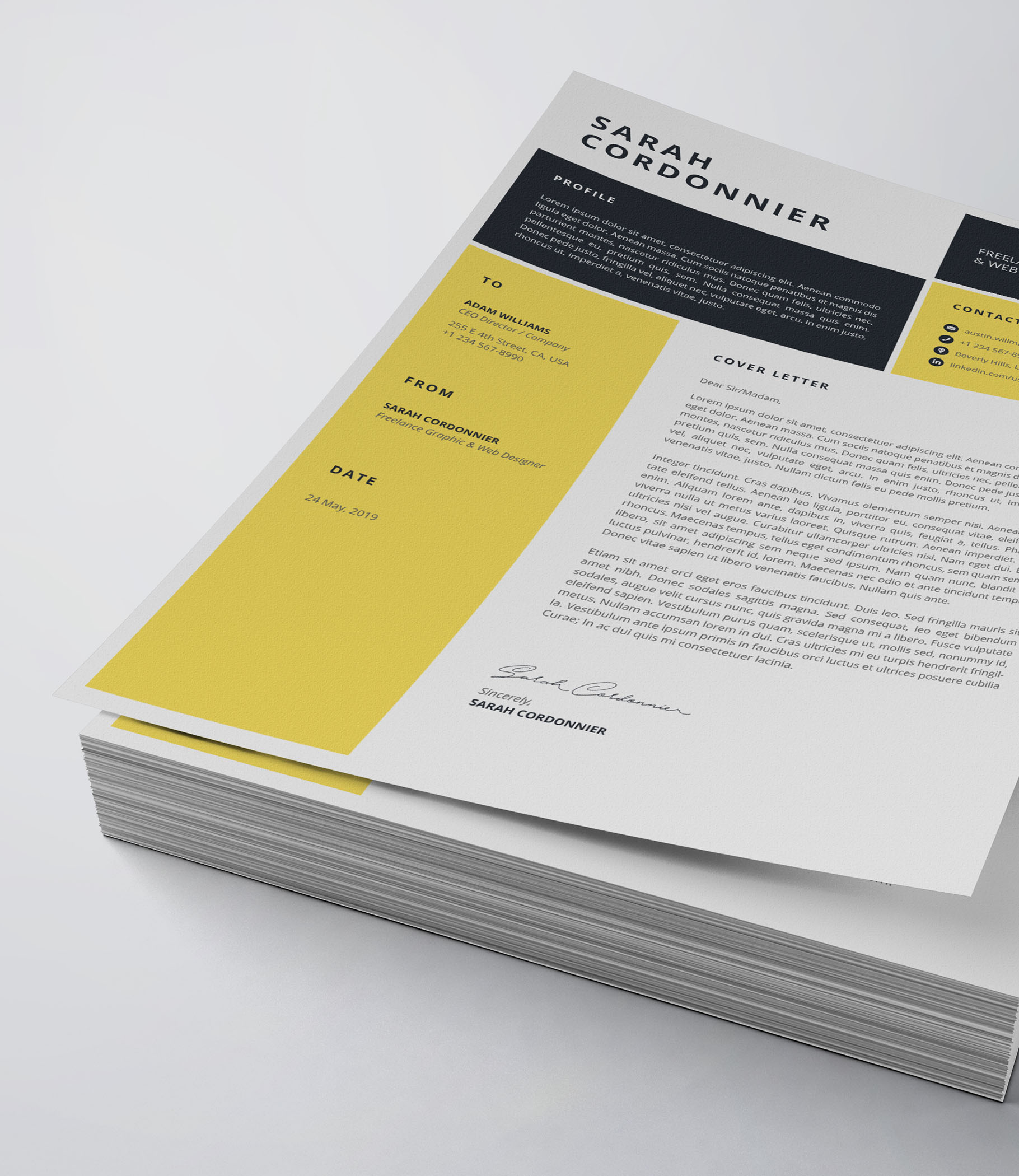 Yellow and black resume on top of a stack of papers.