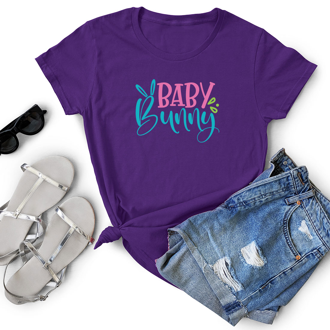 Purple shirt with the words baby bump on it.