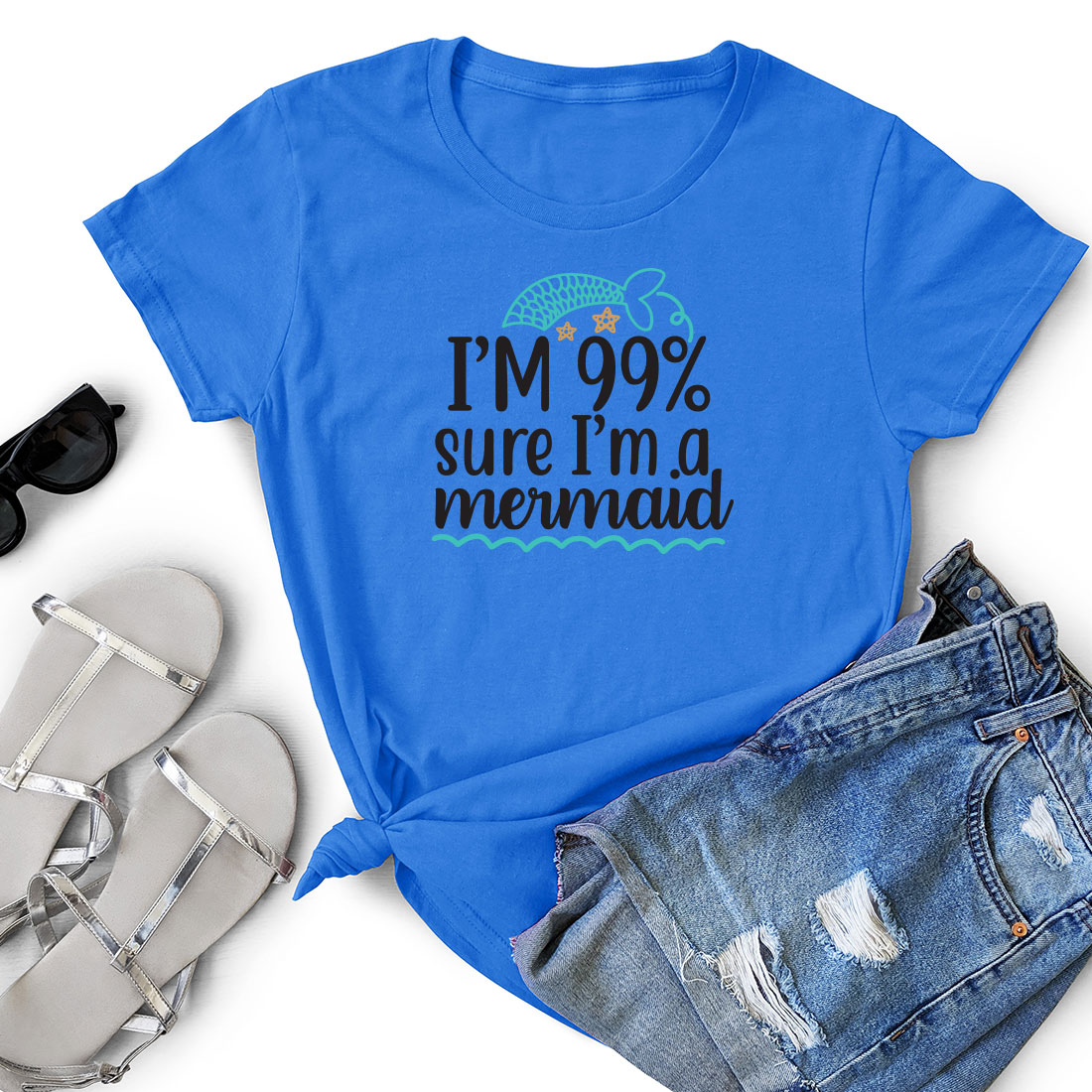 Blue shirt that says i'm 99 % sure i'm a mermaid.