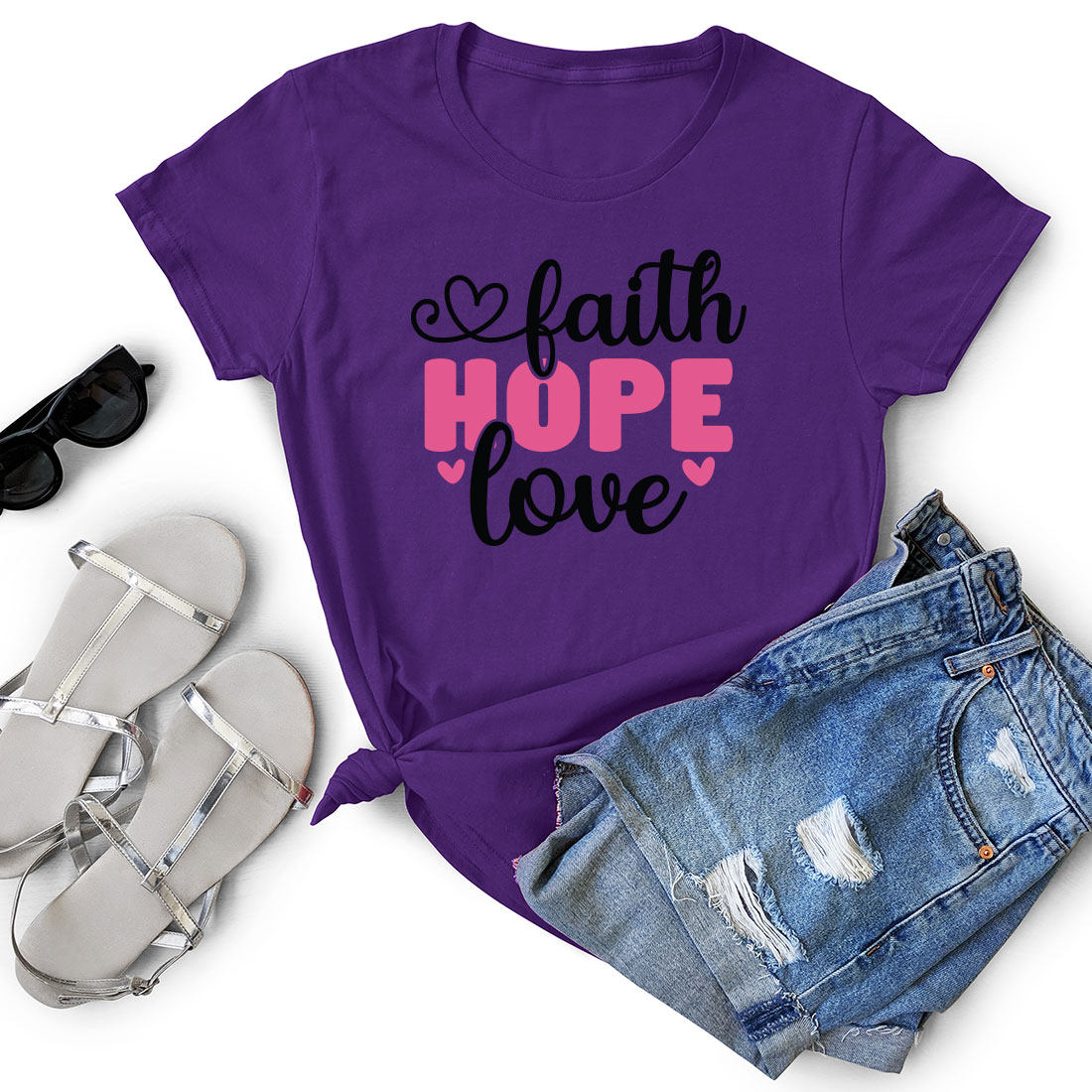 T - shirt that says faith hope love next to a pair of shorts.