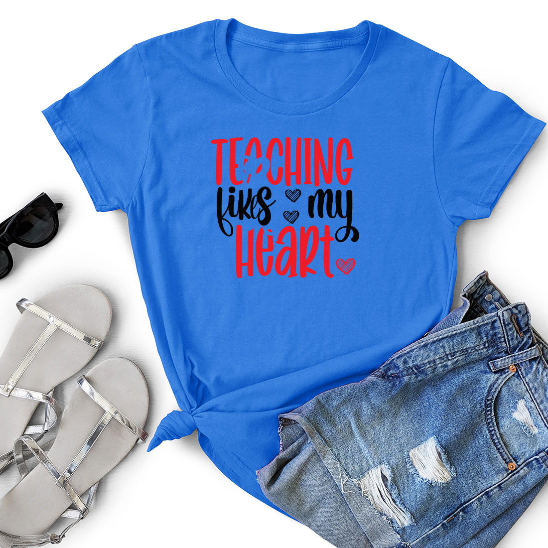 T - shirt that says teaching has my heart on it.