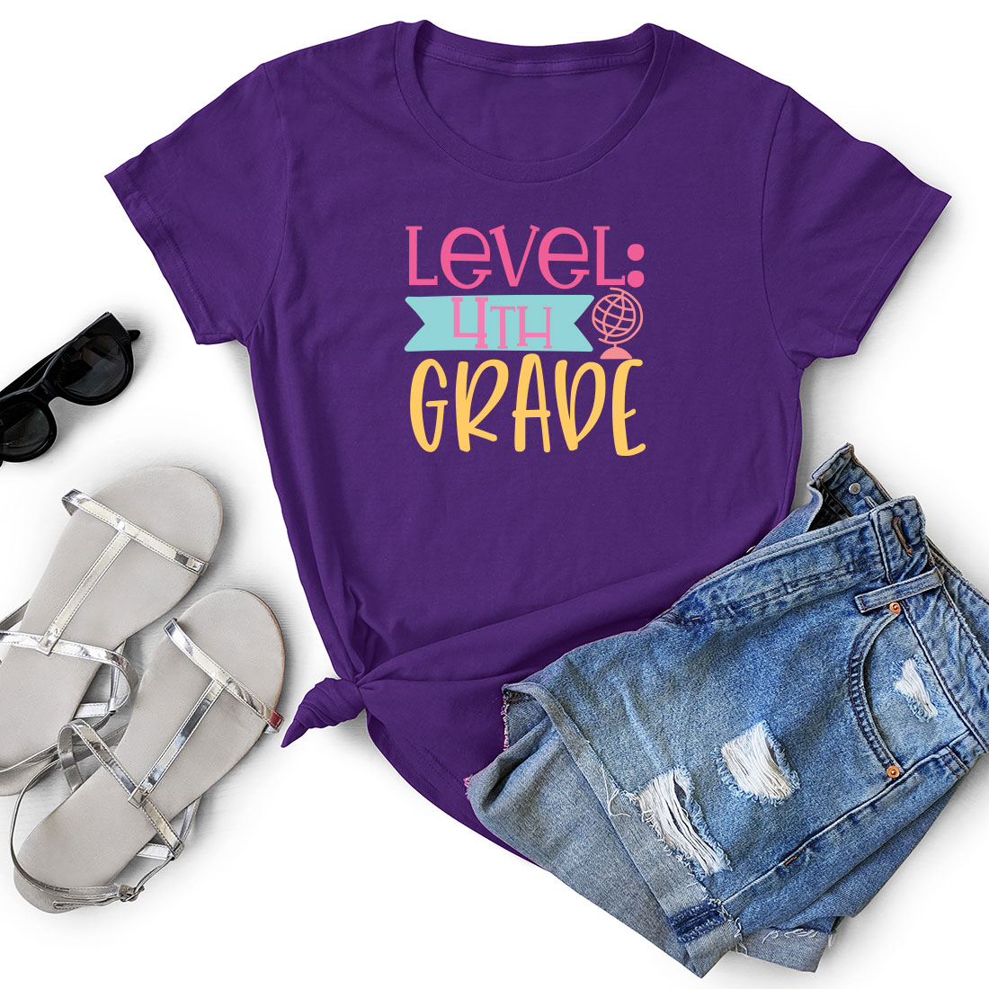 T - shirt that says level in the grade next to a pair of shorts.