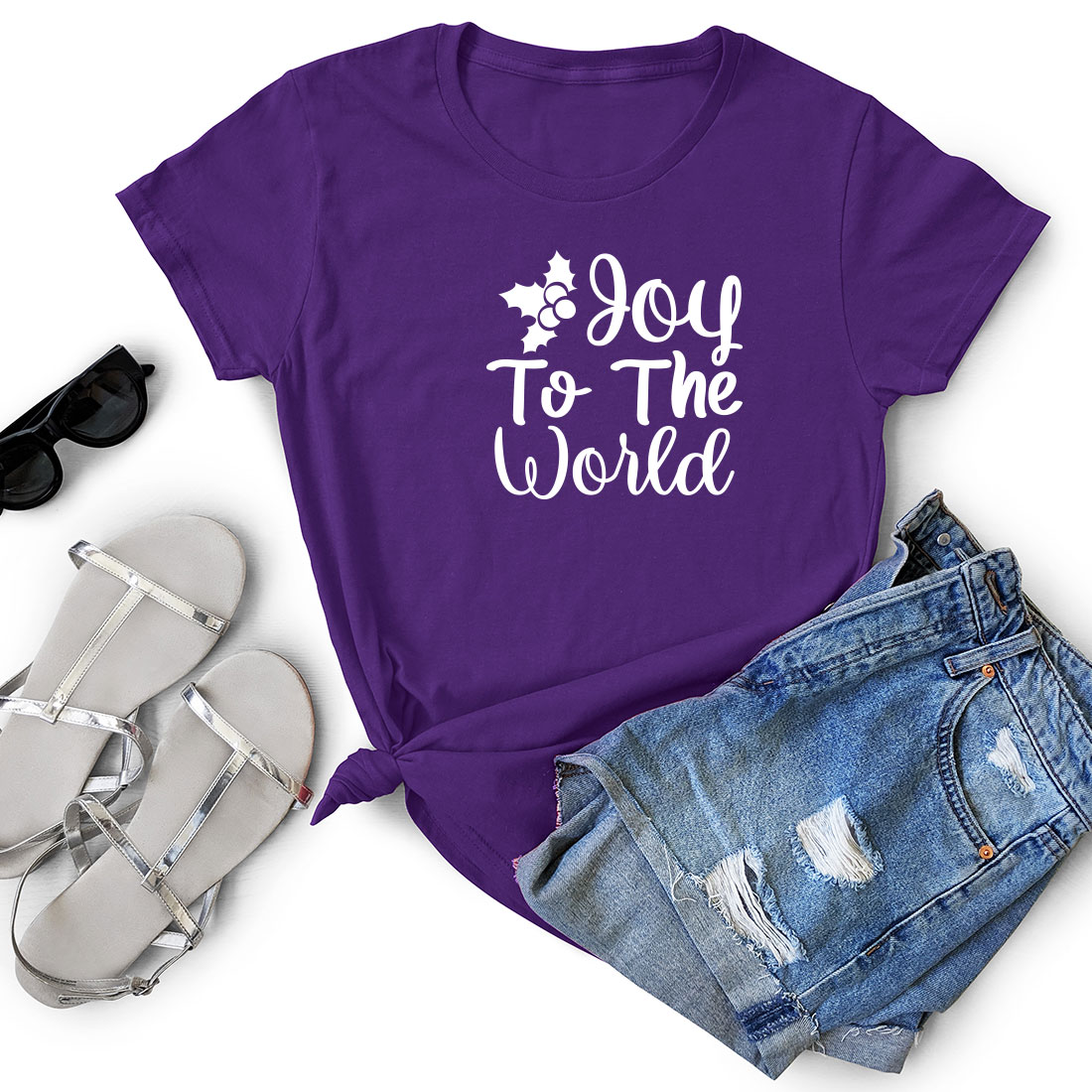 T - shirt that says joy to the world next to a pair of shorts.