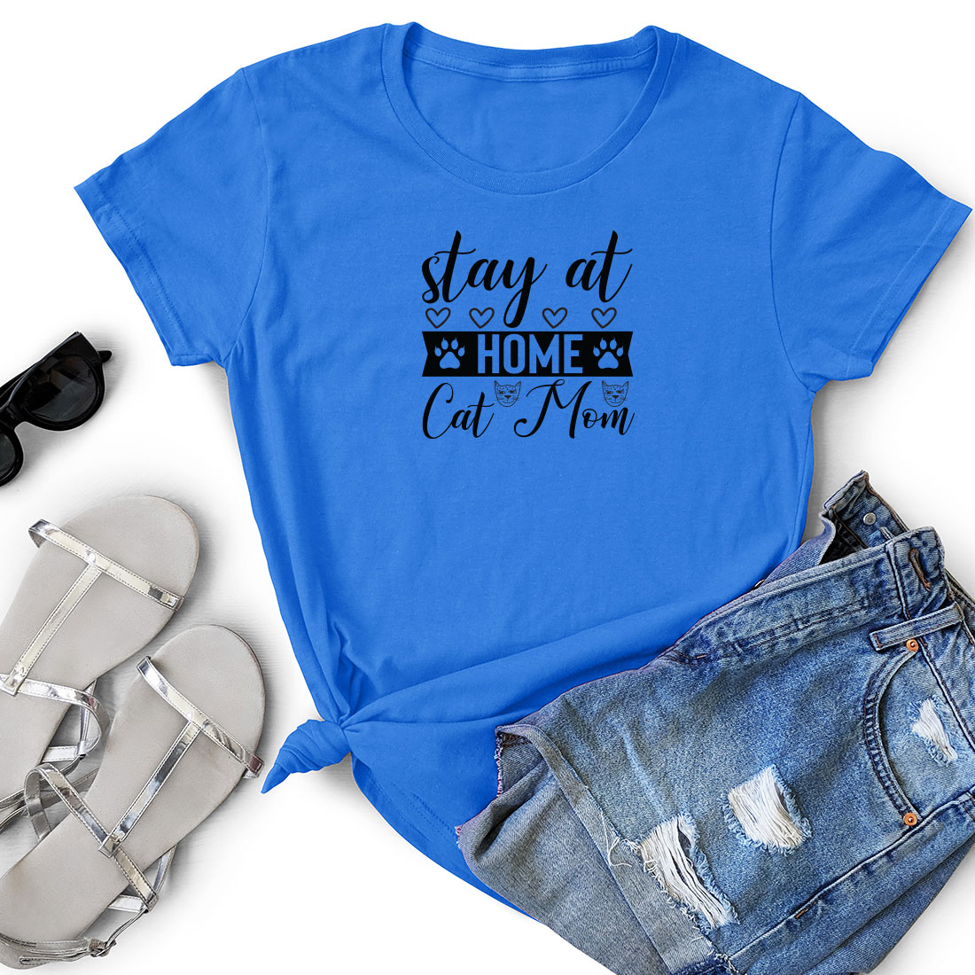 Blue shirt that says stay at home cat mom.