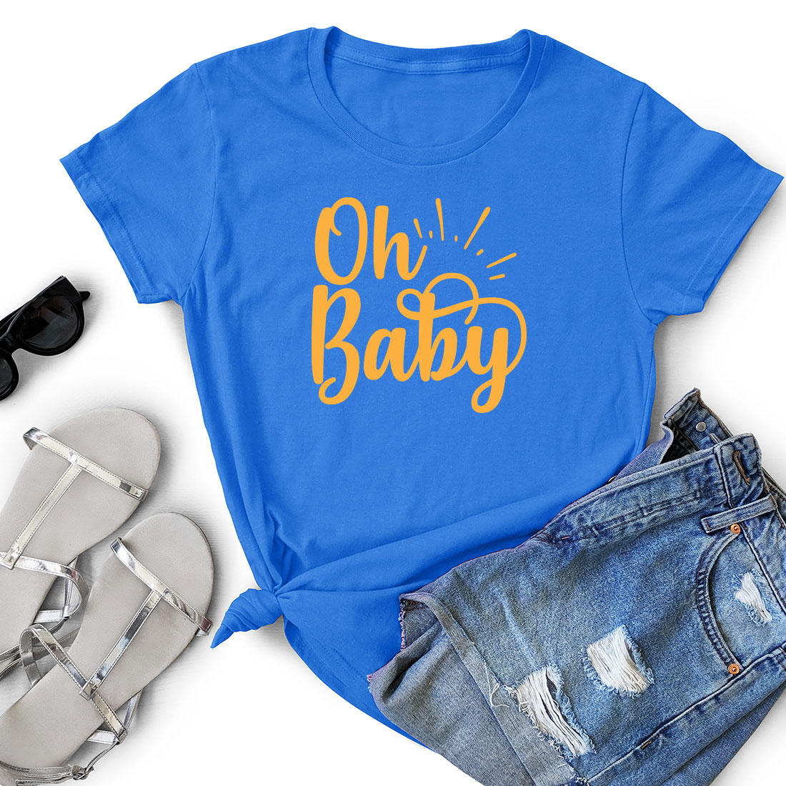 T - shirt that says oh baby next to a pair of shorts.
