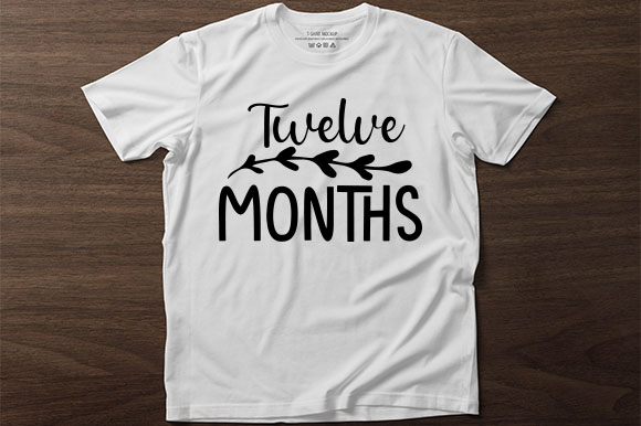 White t - shirt with the words twelve months printed on it.