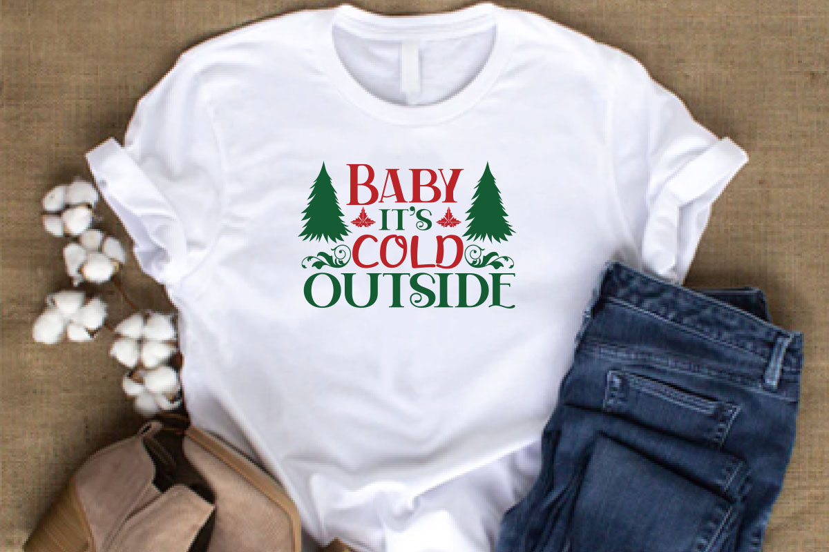 T - shirt that says baby it's cold outside.