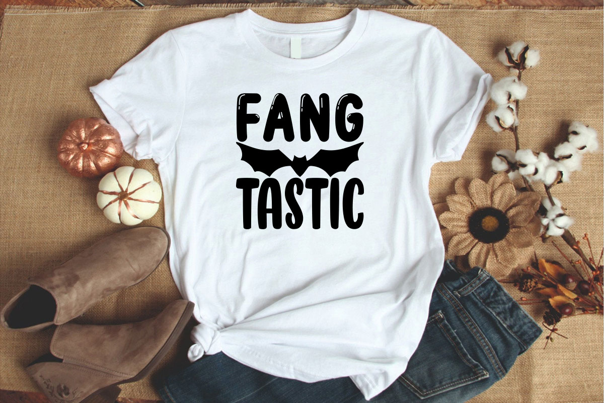 T - shirt with the words fangg tastic on it.