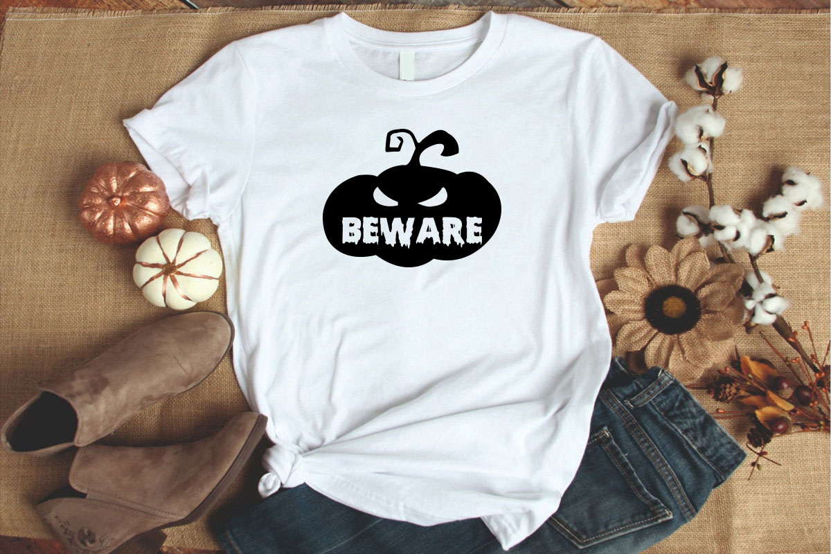 White t - shirt with the words beware printed on it.