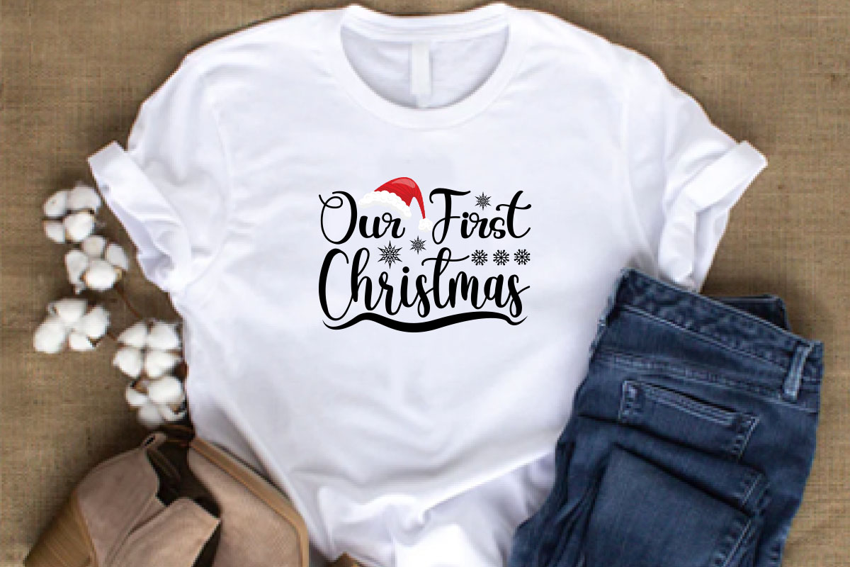 T - shirt that says our first christmas.