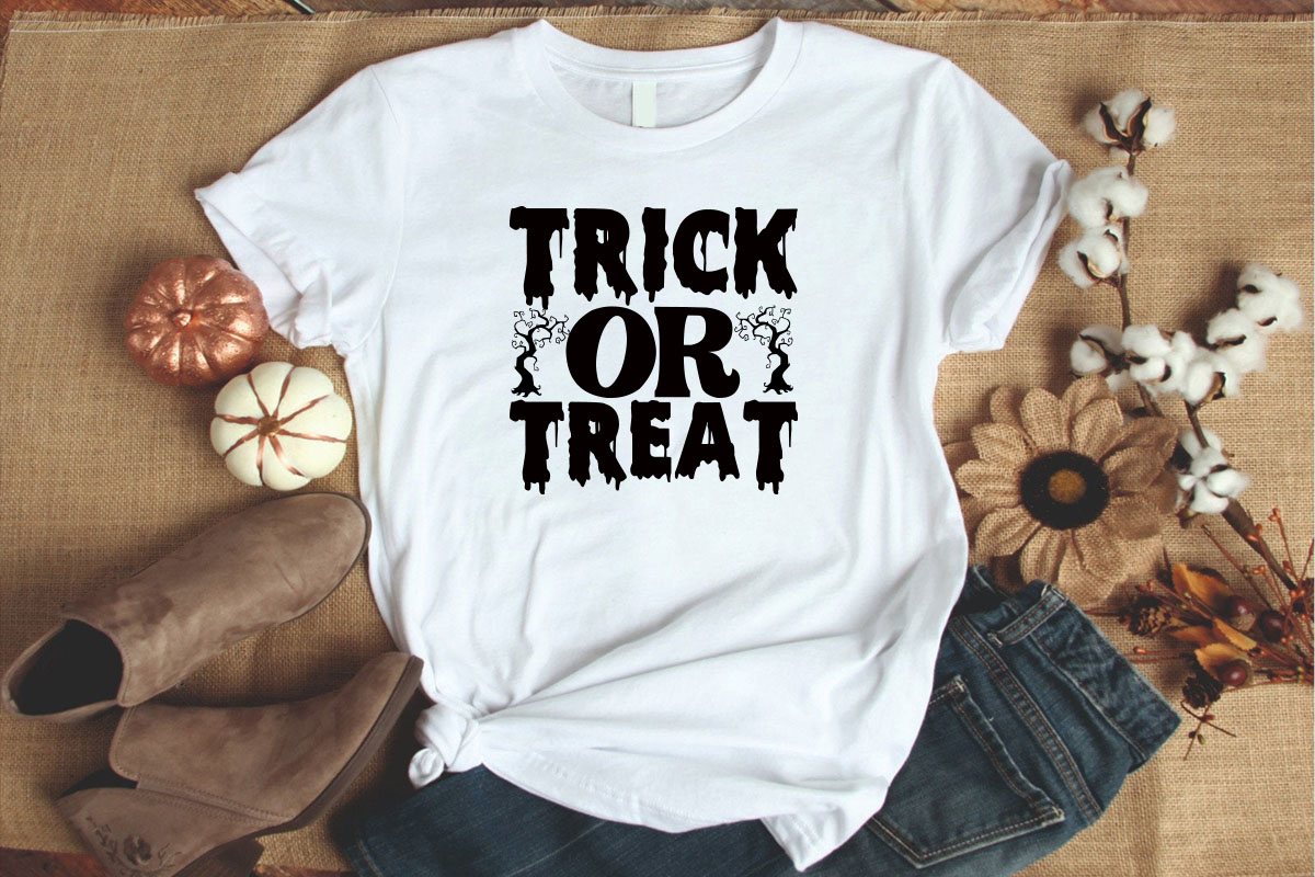 White shirt that says trick or treat on it.