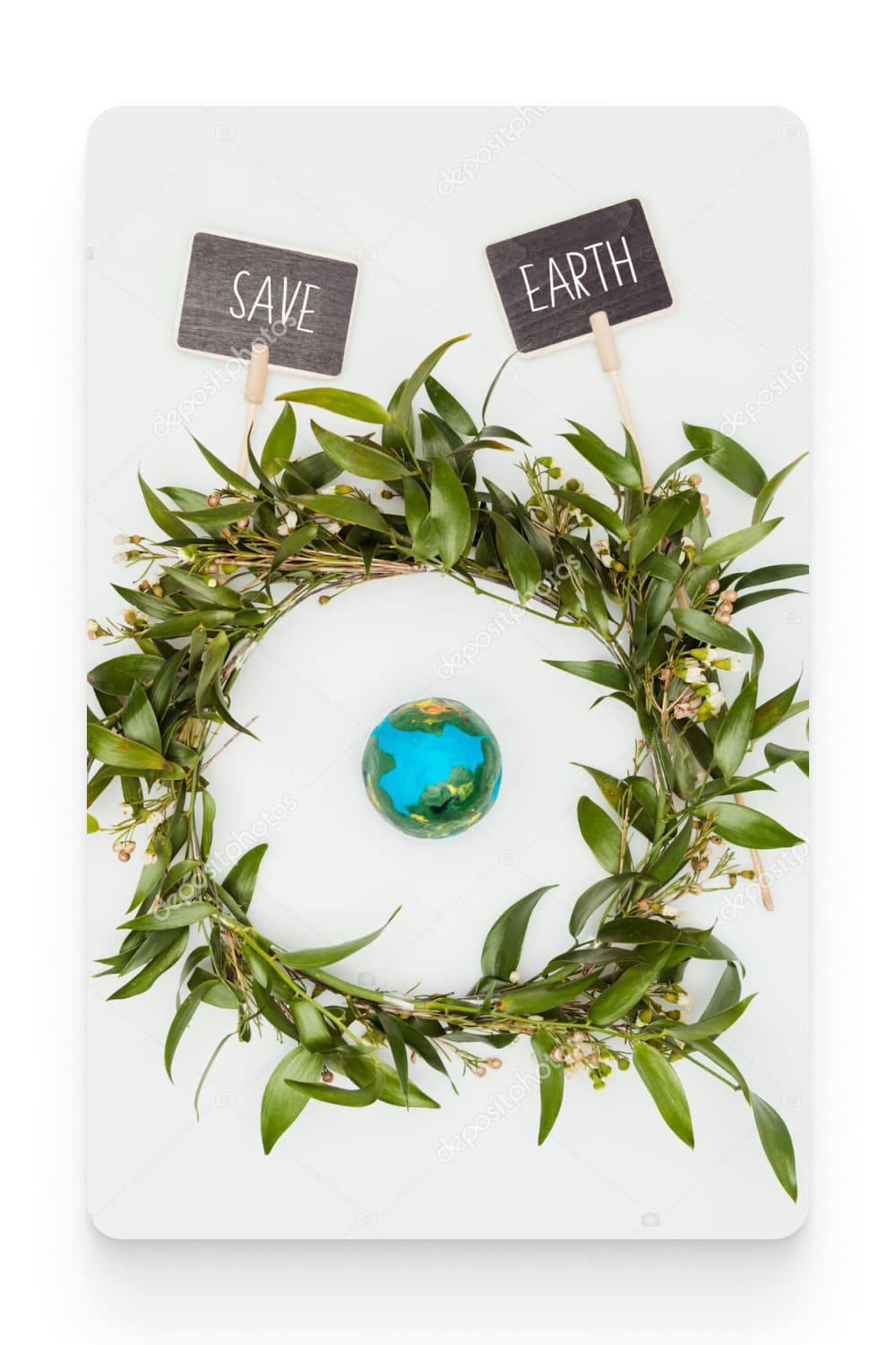 Top view of earth model inside wreath with signs save earth isolated on white.