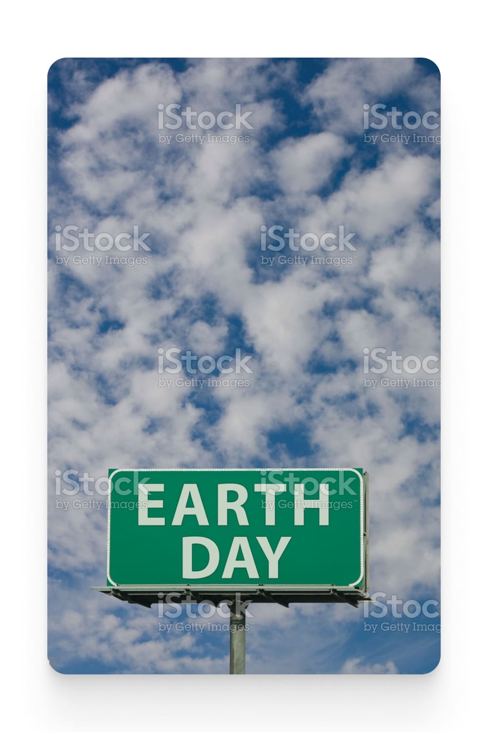 Road sign Earth Day on the background of the sky with clouds