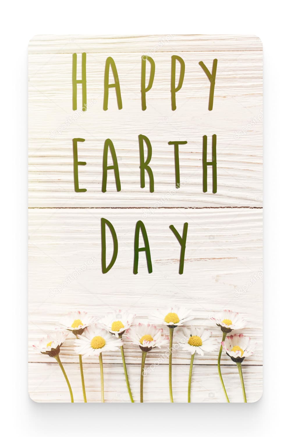 Happy earth day text sign on beautiful daisy flowers on rustic white wooden background top view. greeting card. environmental concept.