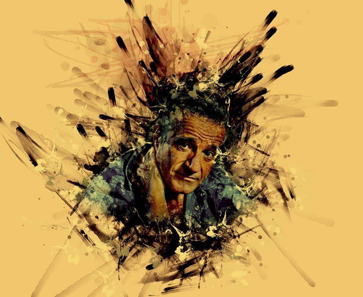 Painting of a man's face surrounded by paint splatters.