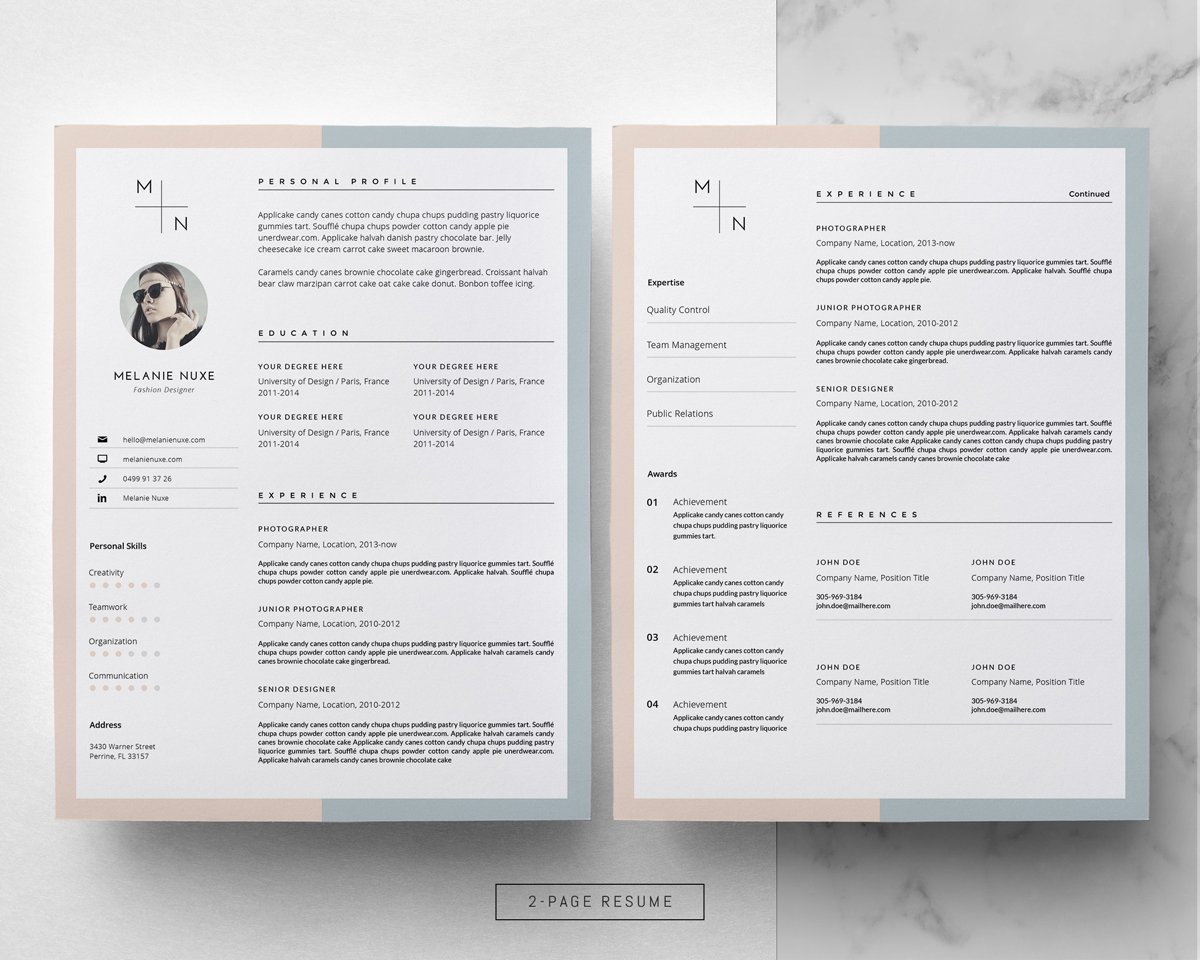 Two pages of a resume on a marble surface.