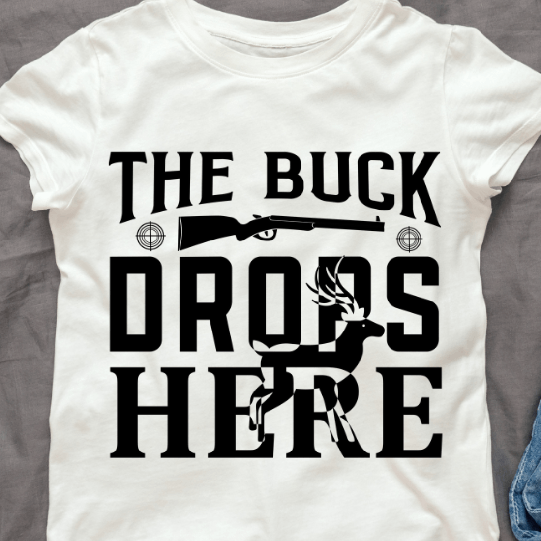 T - shirt that says the buck drops here.