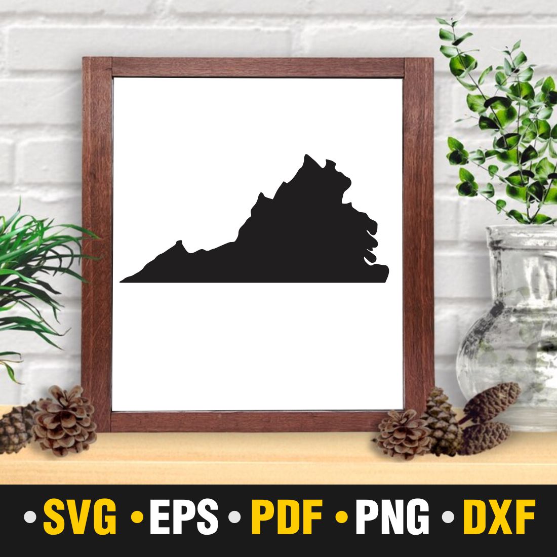 Black and white picture of a mountain in a frame.