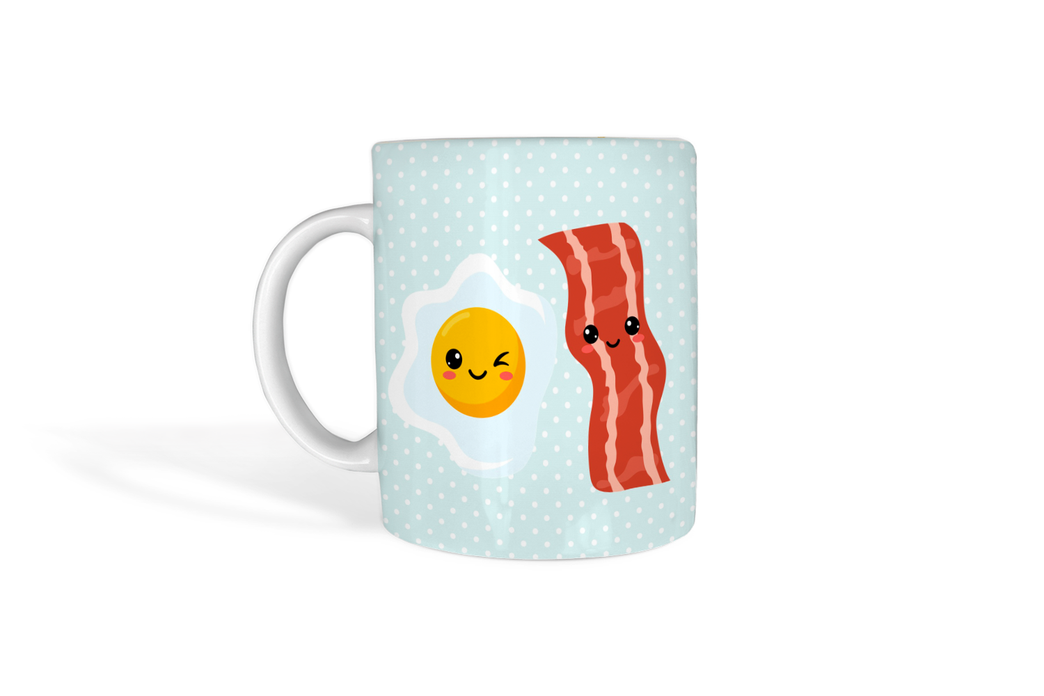 Coffee mug with bacon and eggs on it.