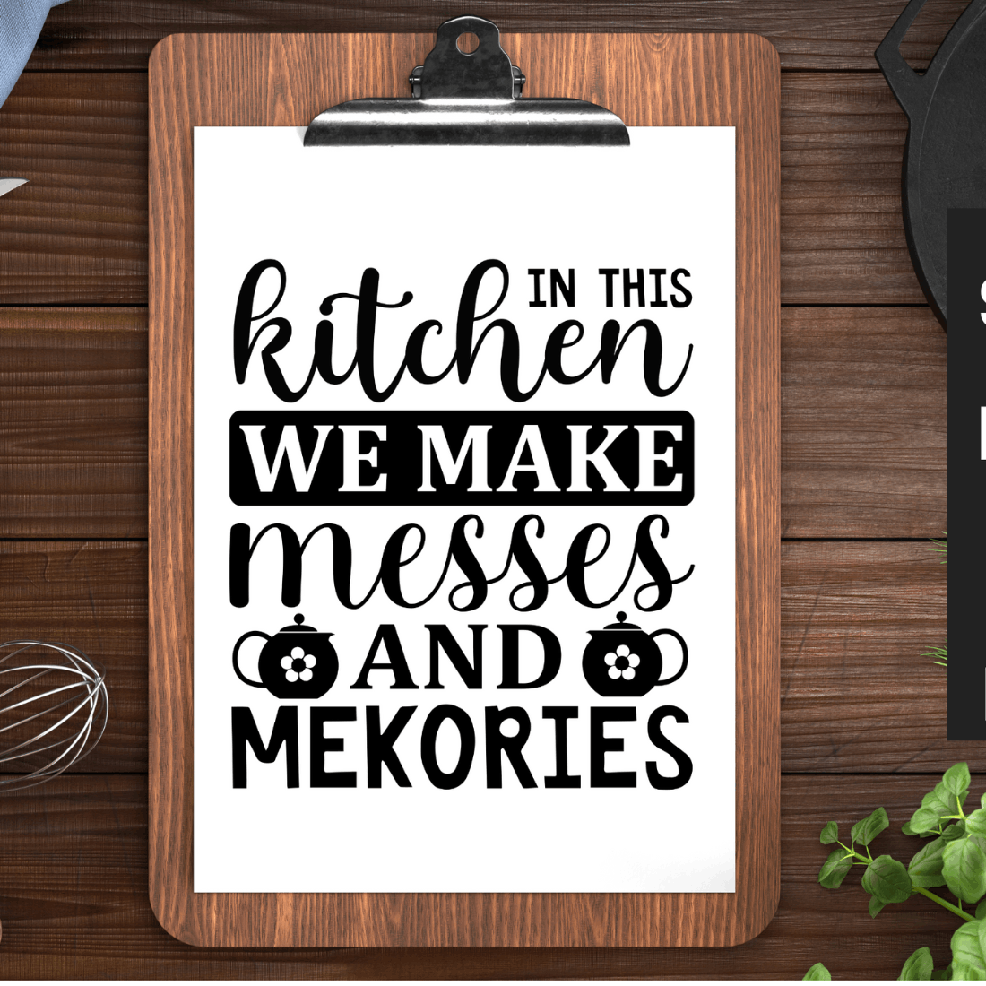 Clipboard with the words in this kitchen we make messes and me ko.
