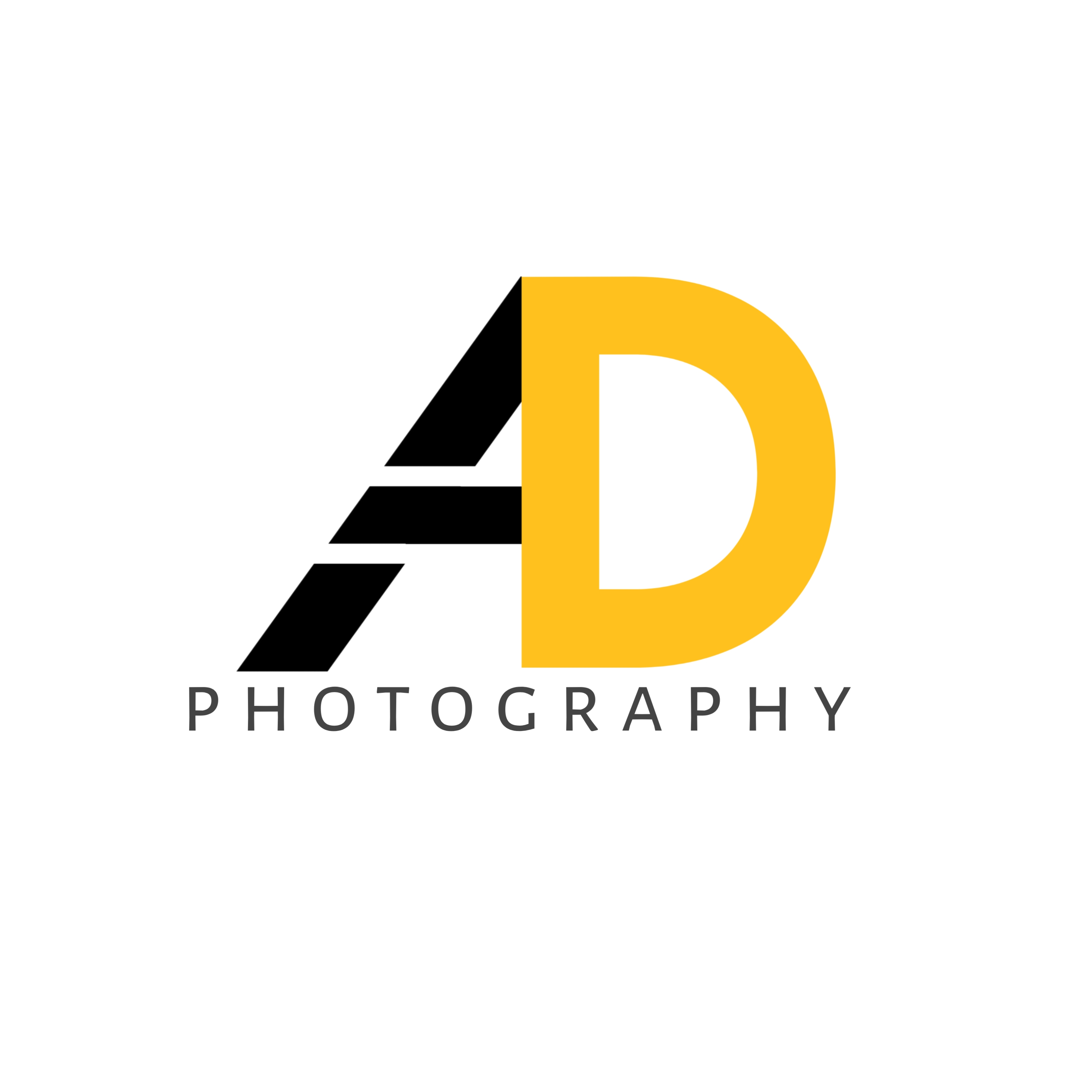 Black and yellow logo for a photographer.