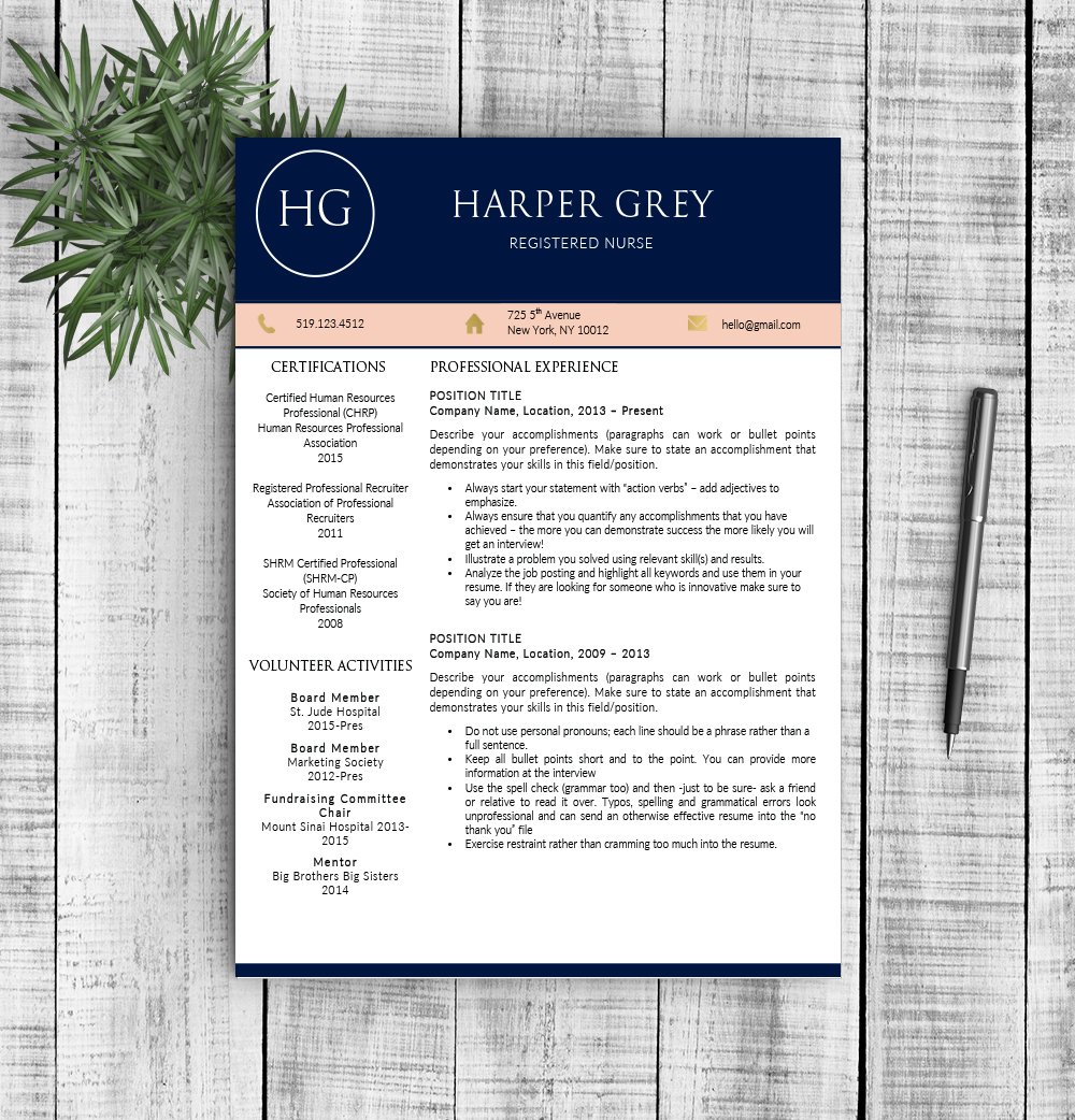 Blue and orange resume on a wooden table.