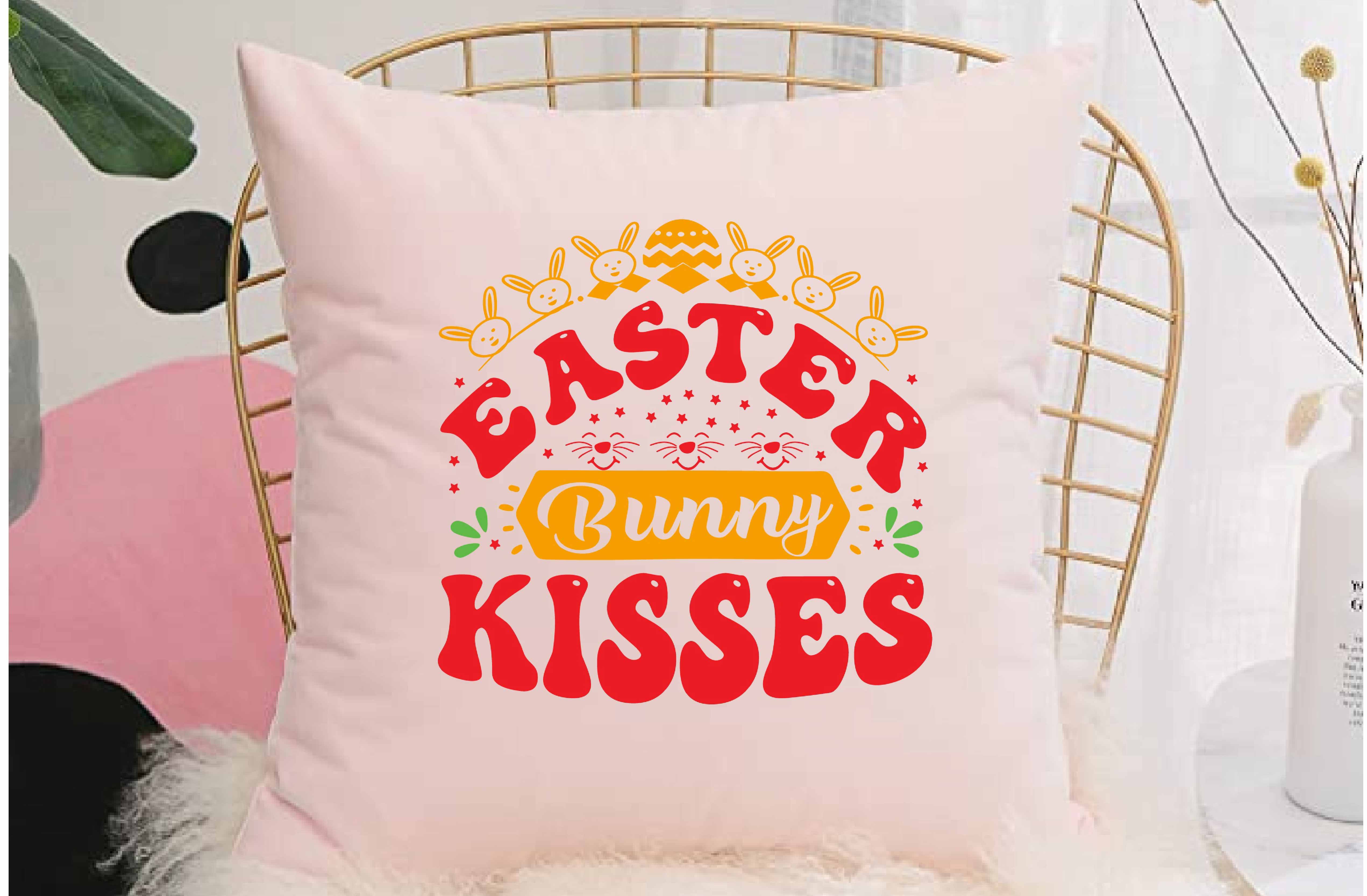 Pink pillow with the words easter bunny kisses on it.