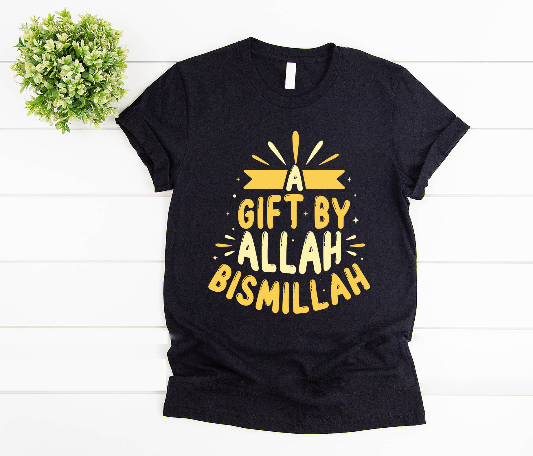 T - shirt that says a gift by allah bismillah.