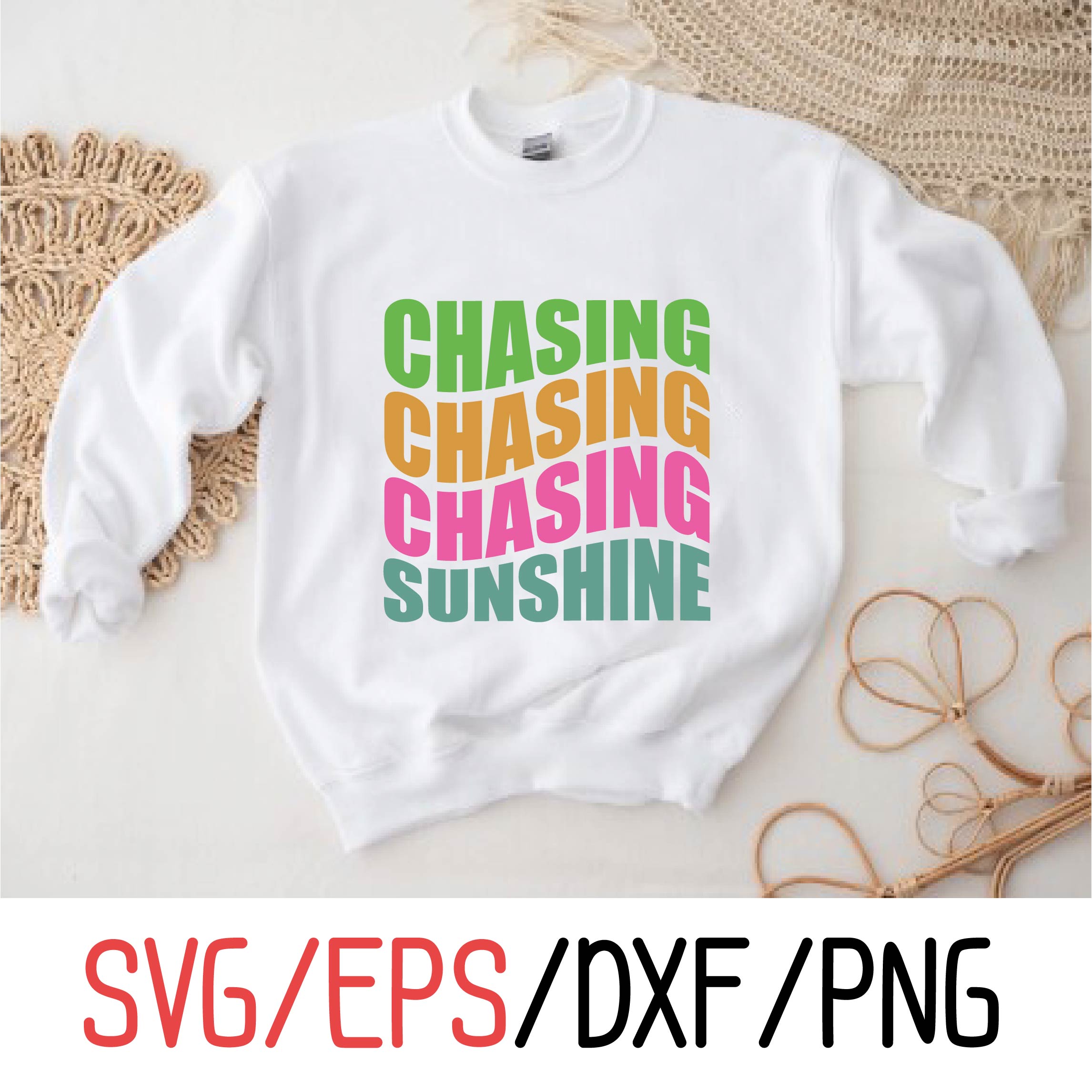 White sweatshirt with the words chasing chasing sunshine on it.
