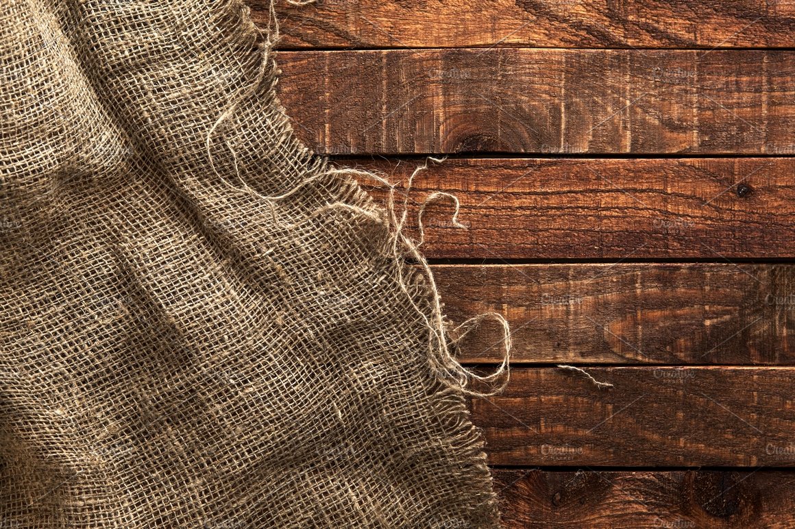 Rustic burlap on a wooden table preview image.
