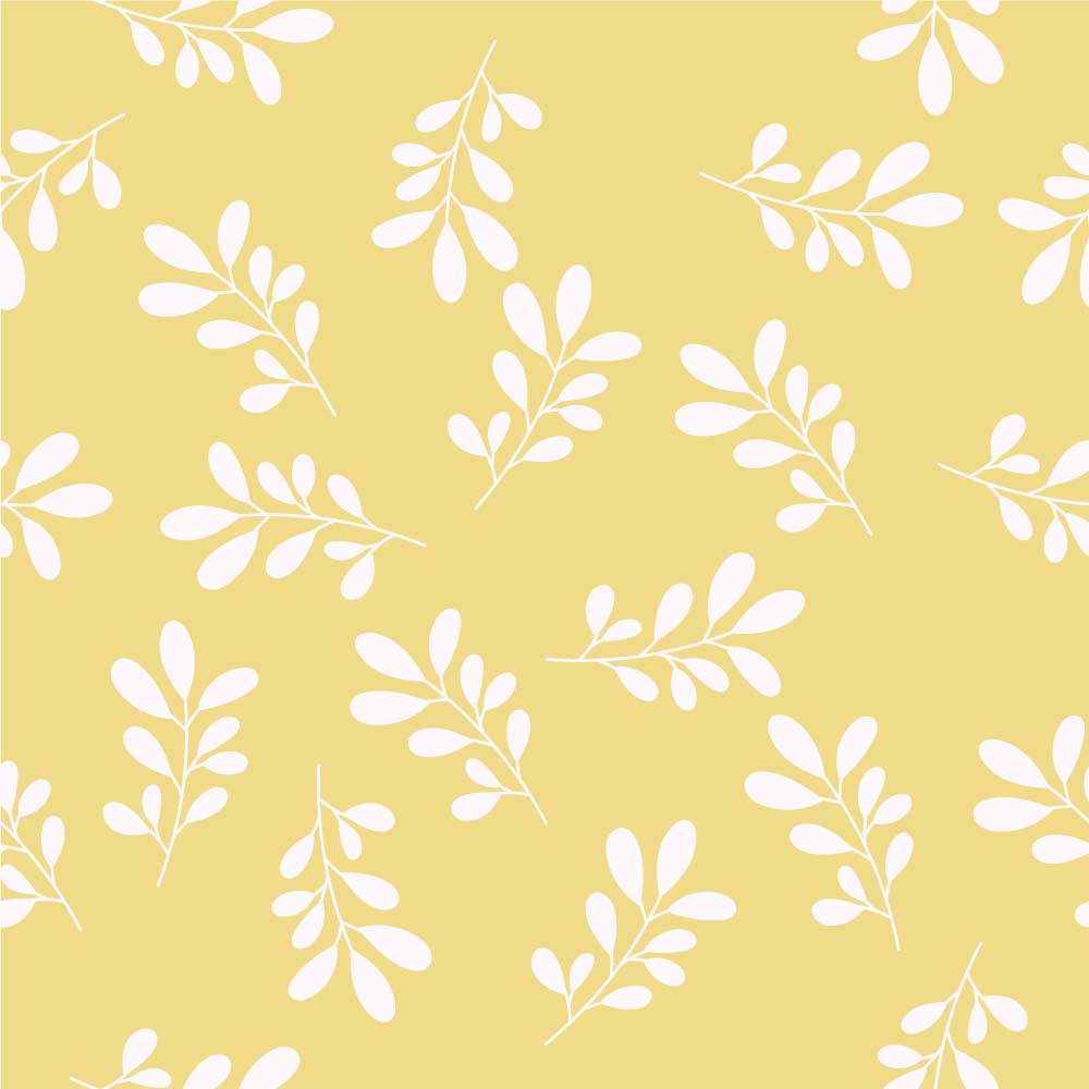 Yellow background with white leaves on it.