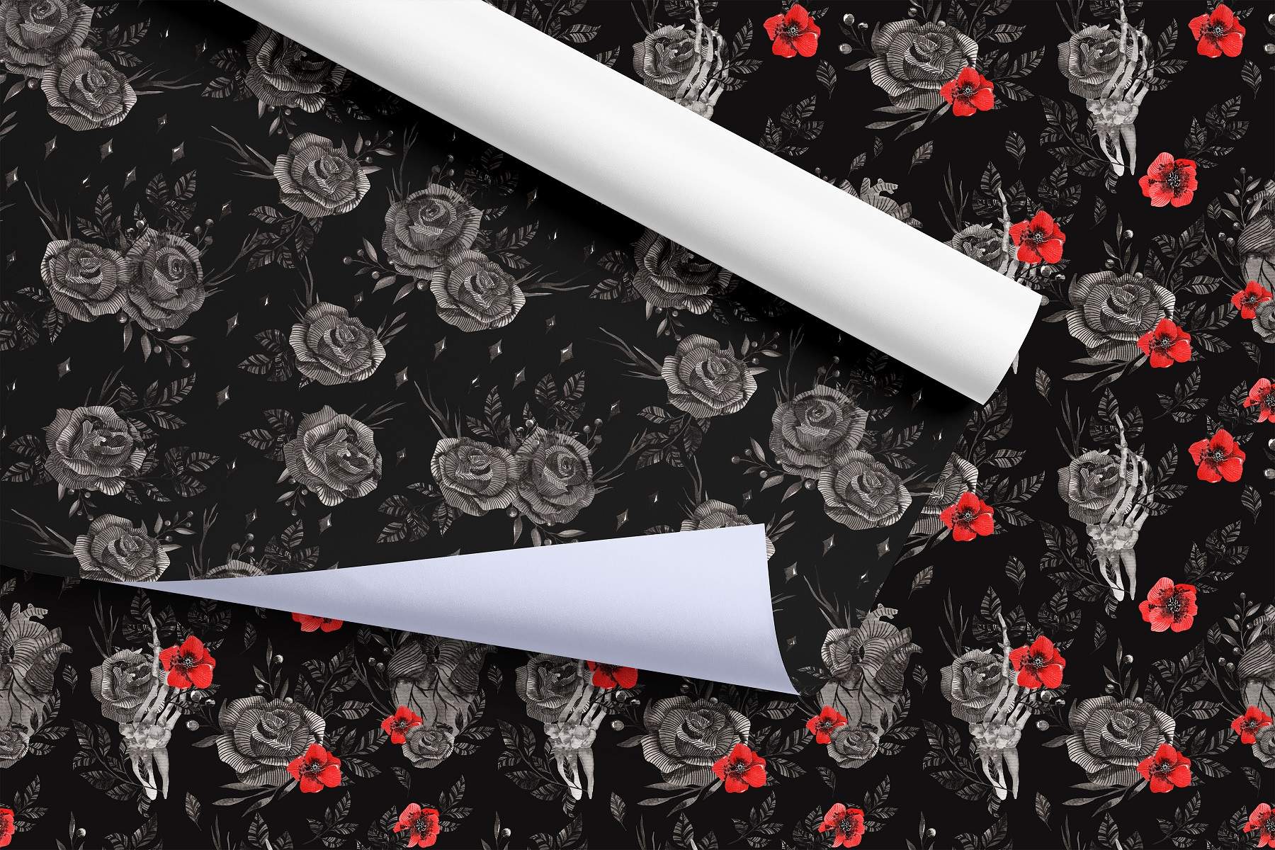 Roll of white paper next to a black floral wallpaper.