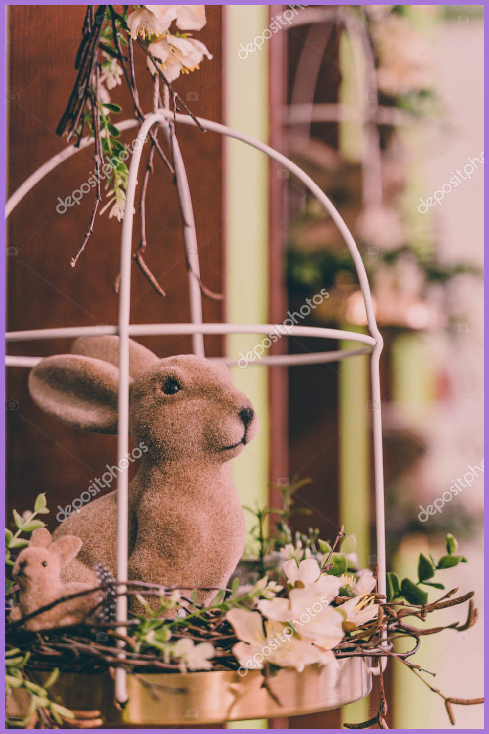Brown Bunny with Blossom Flowers in Cage.