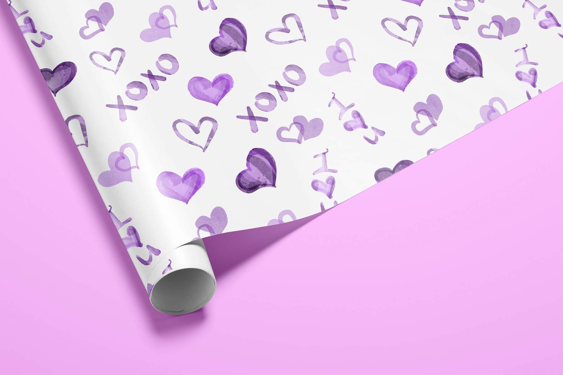 White wrapping paper with purple hearts on it.