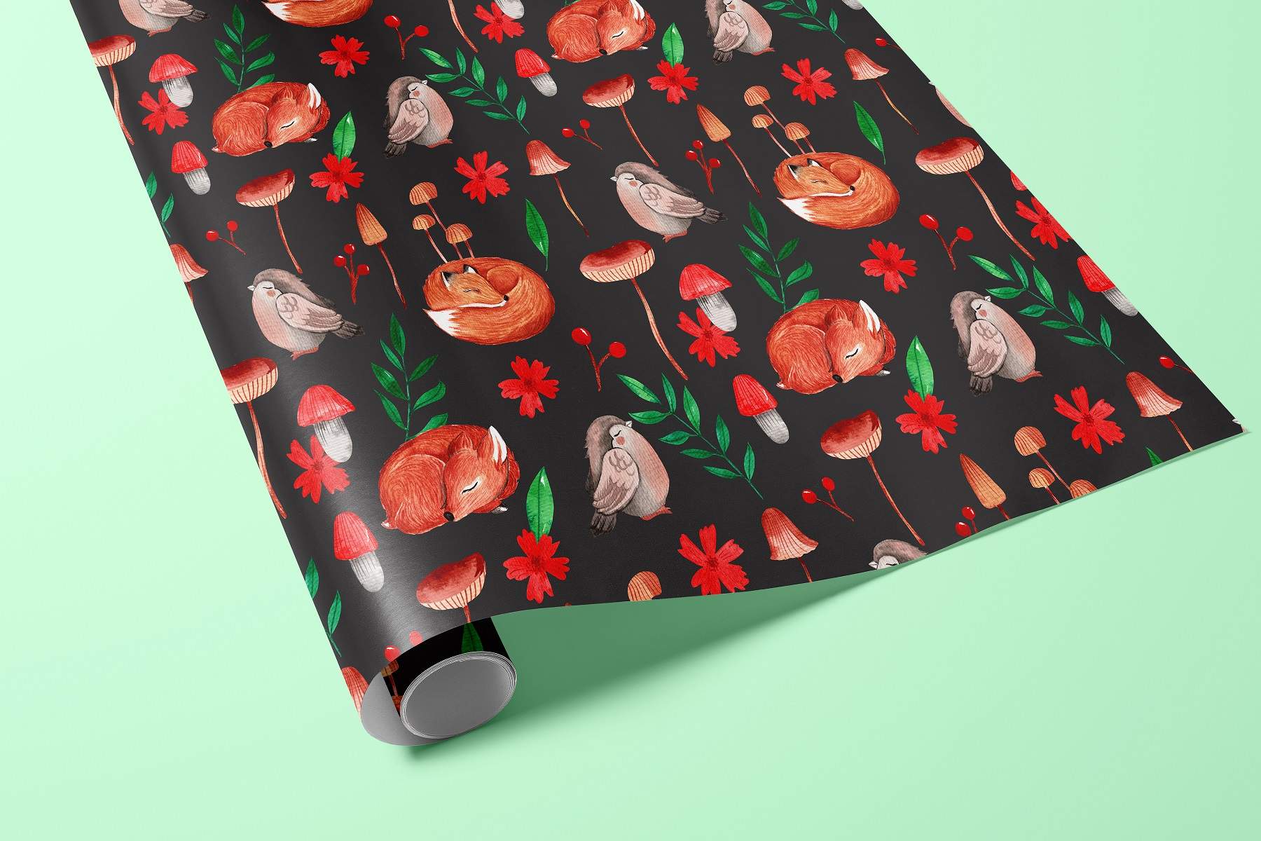 Black wrapping paper with foxes and flowers on it.
