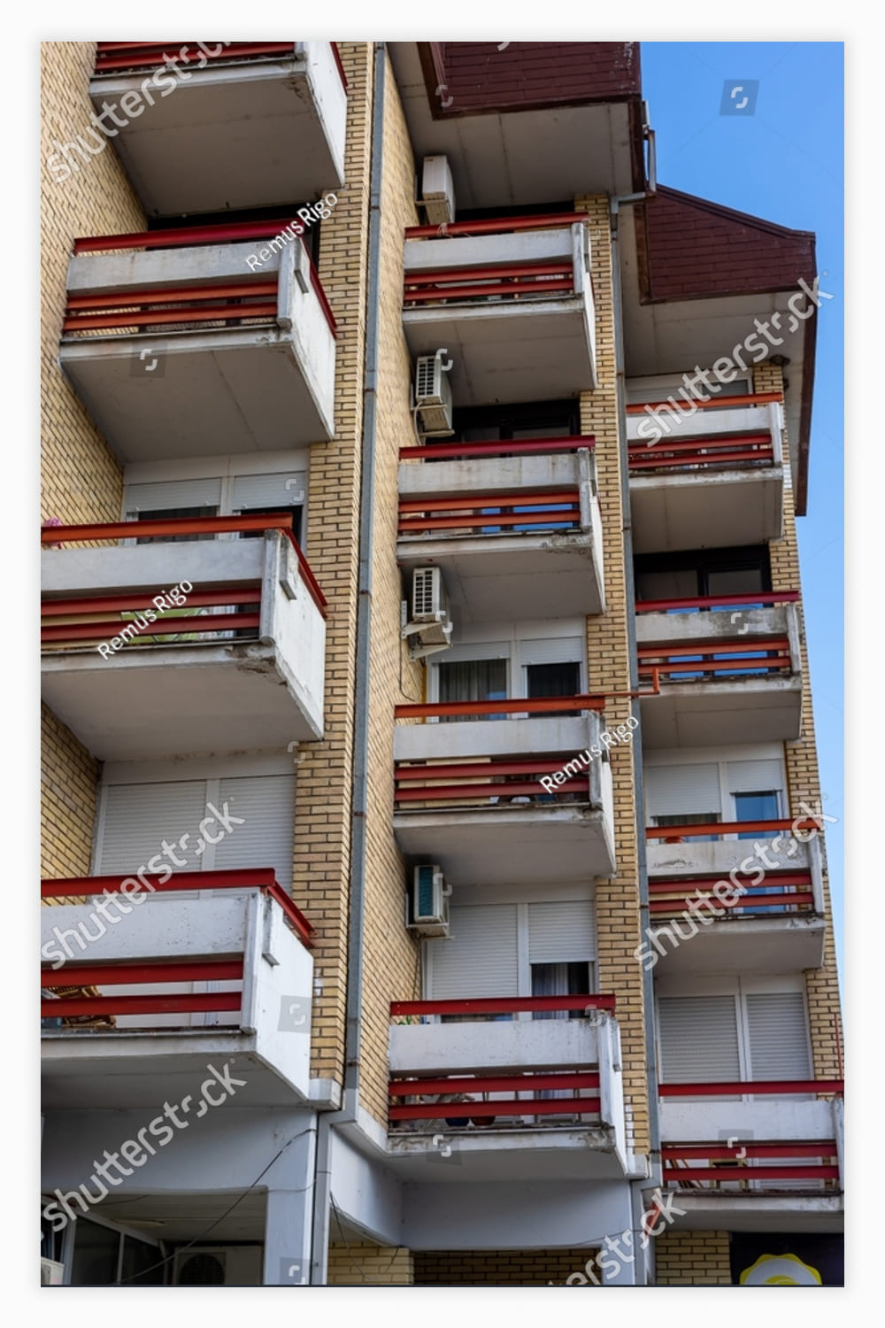 Apartment building with balconies and balconies.