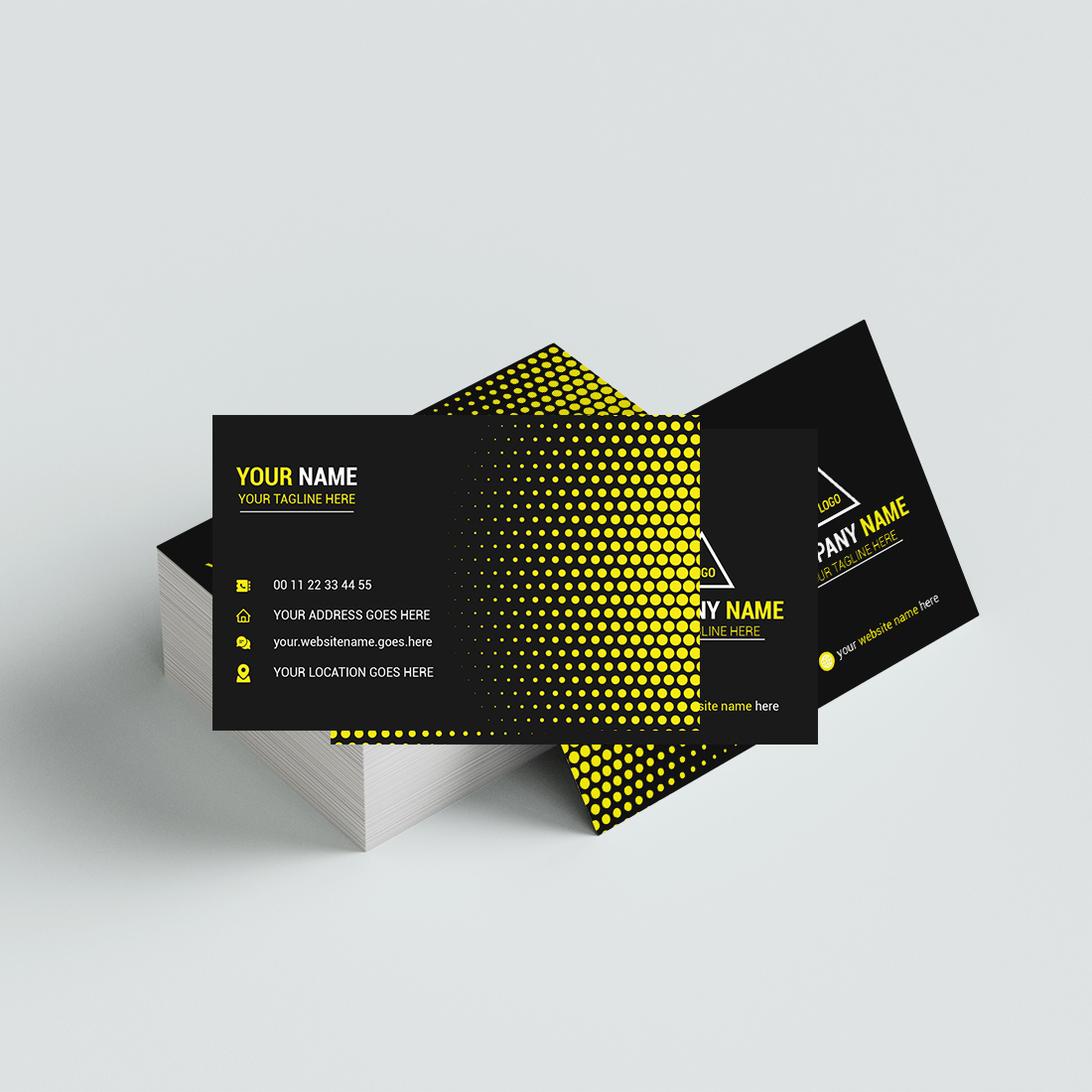 Black and yellow business card on a white surface.