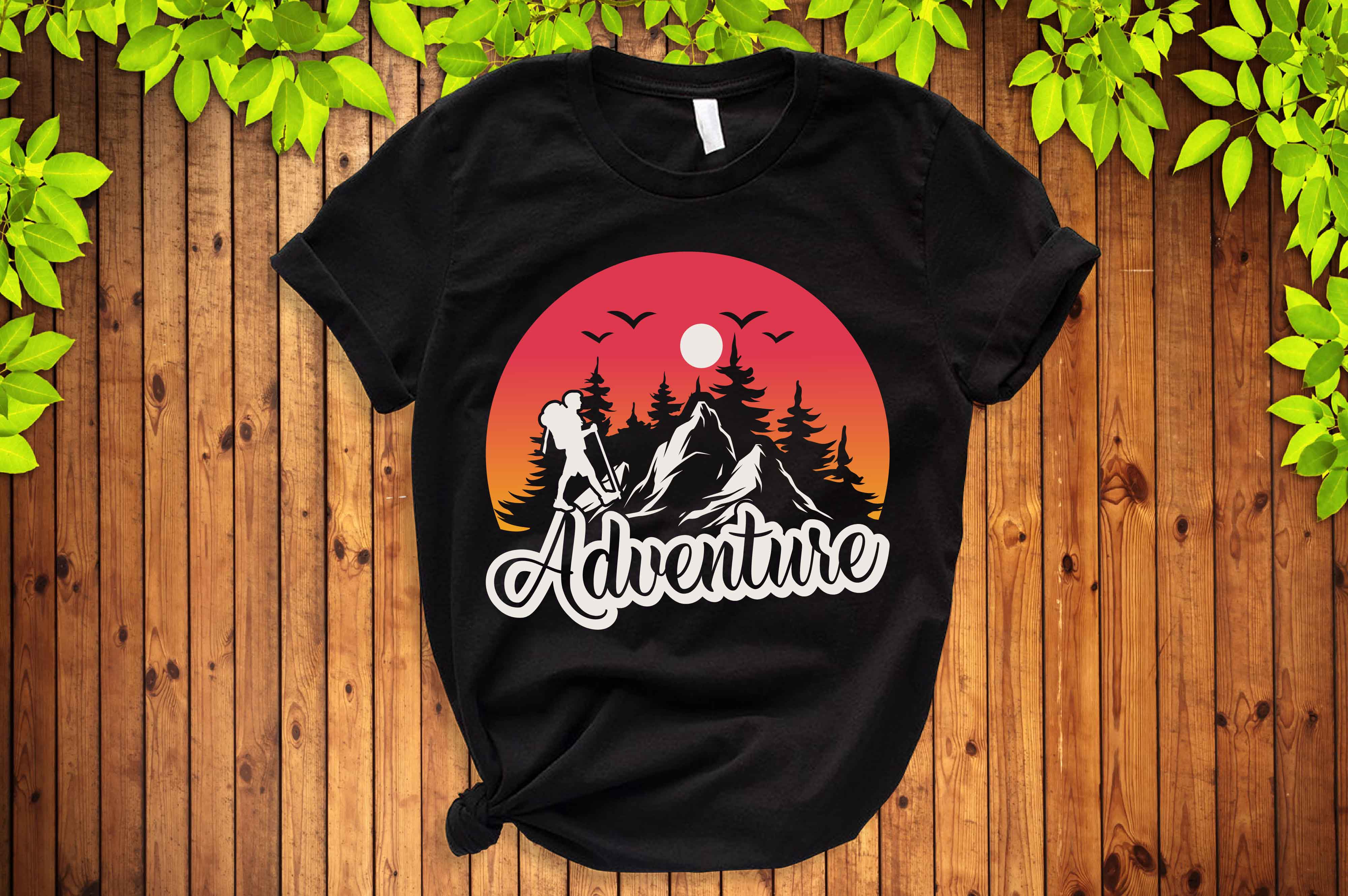 Black t - shirt with the words adventure printed on it.