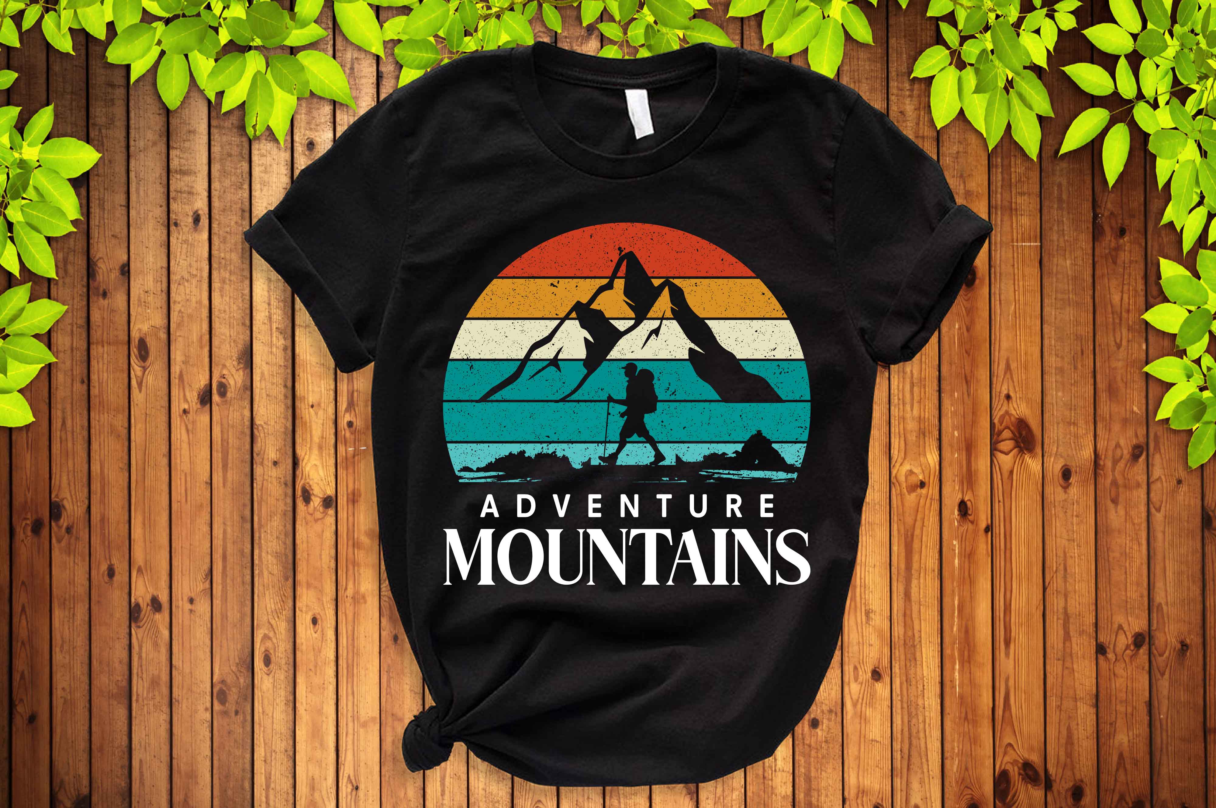 T - shirt that says adventure mountains on it.
