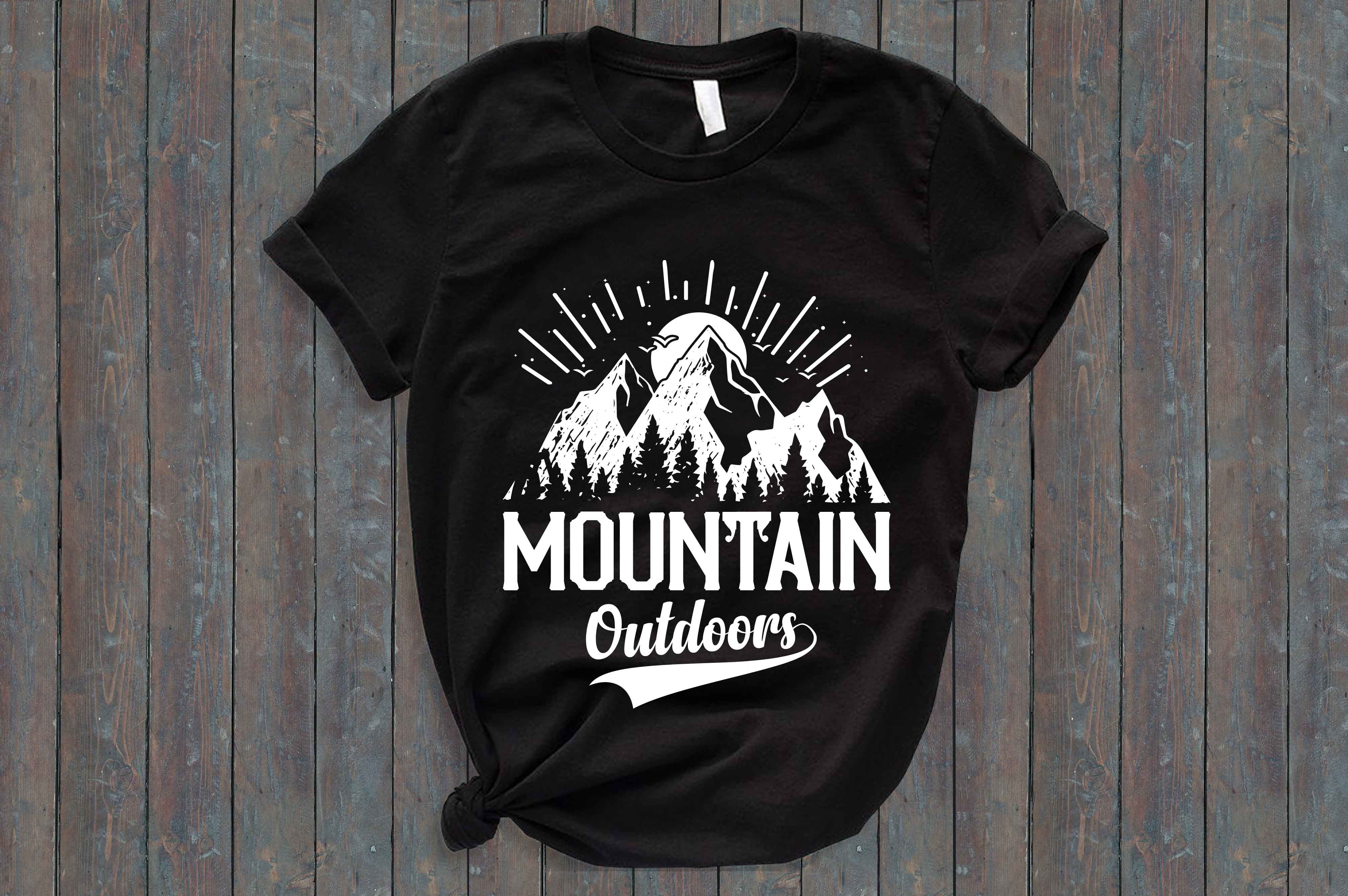 Black shirt that says mountain outdoors on it.