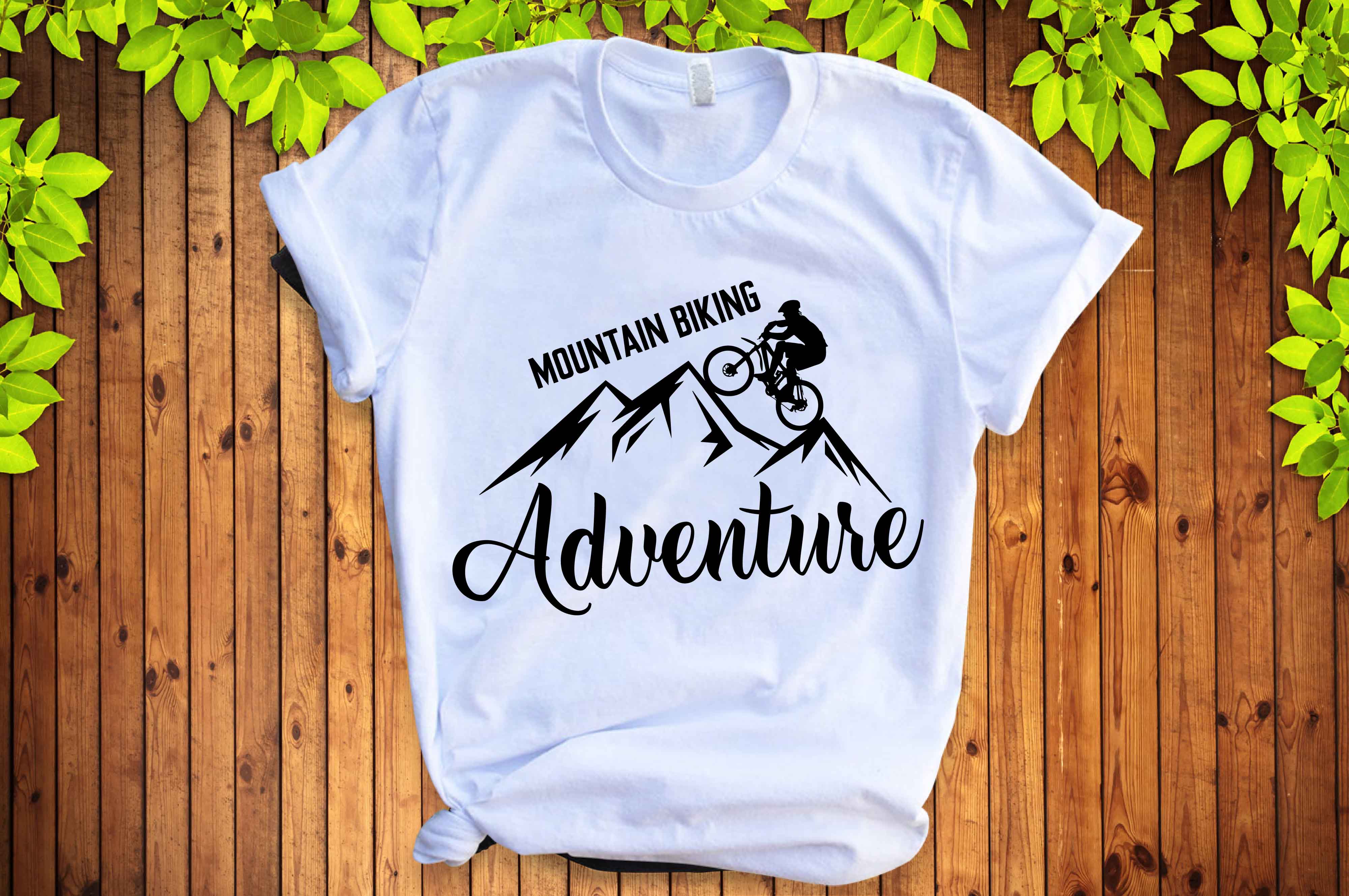 T - shirt that says mountain biking adventure on it.