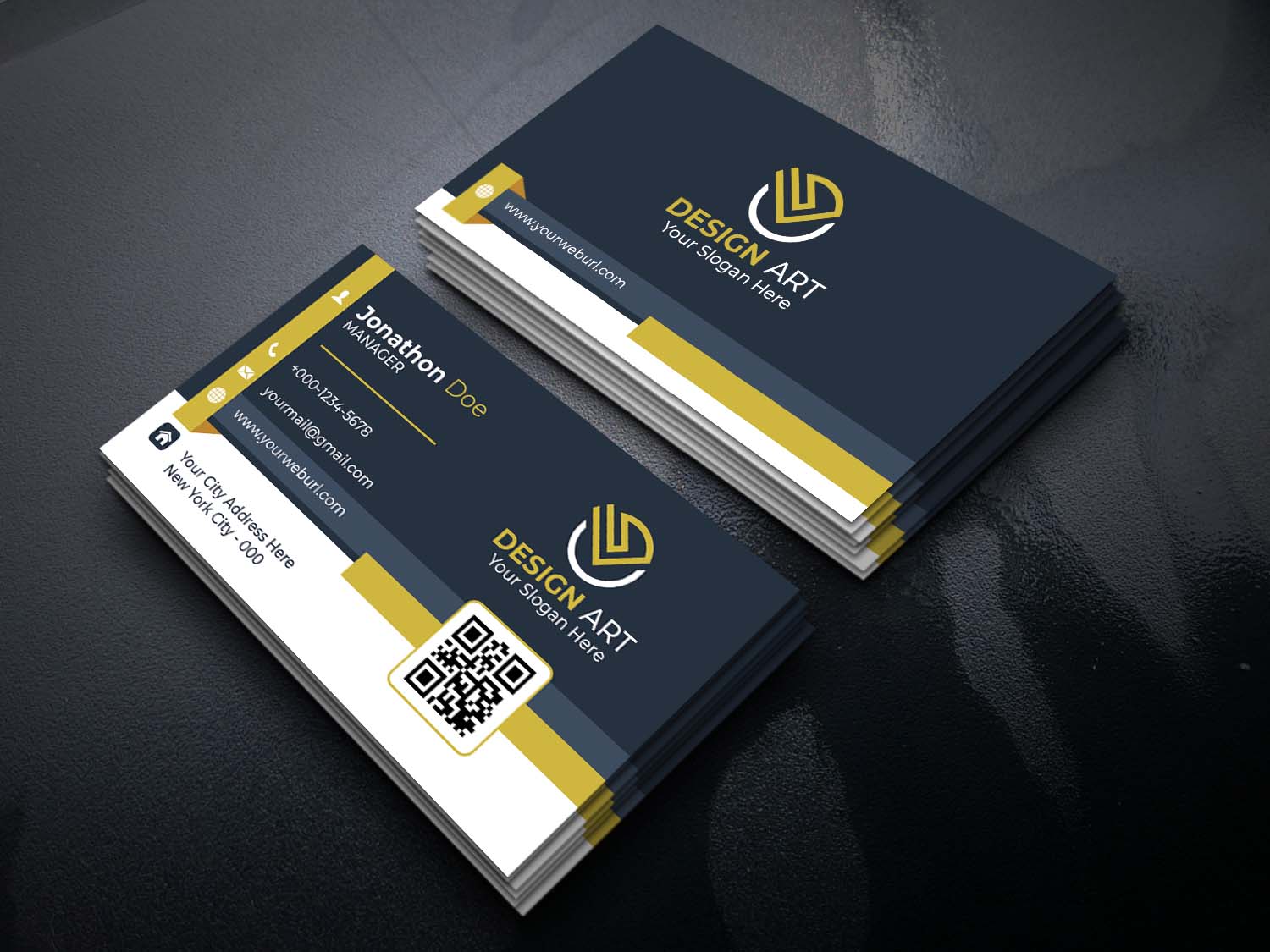 Two business cards on a black surface.