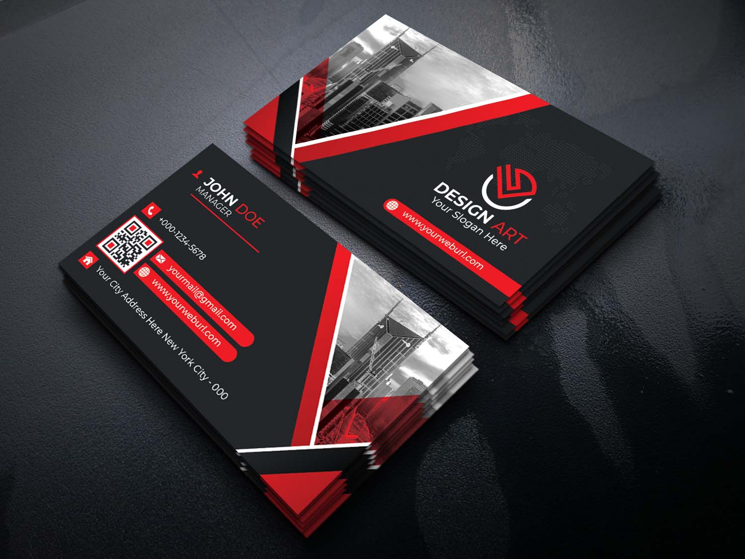 Black and red business card on a table.
