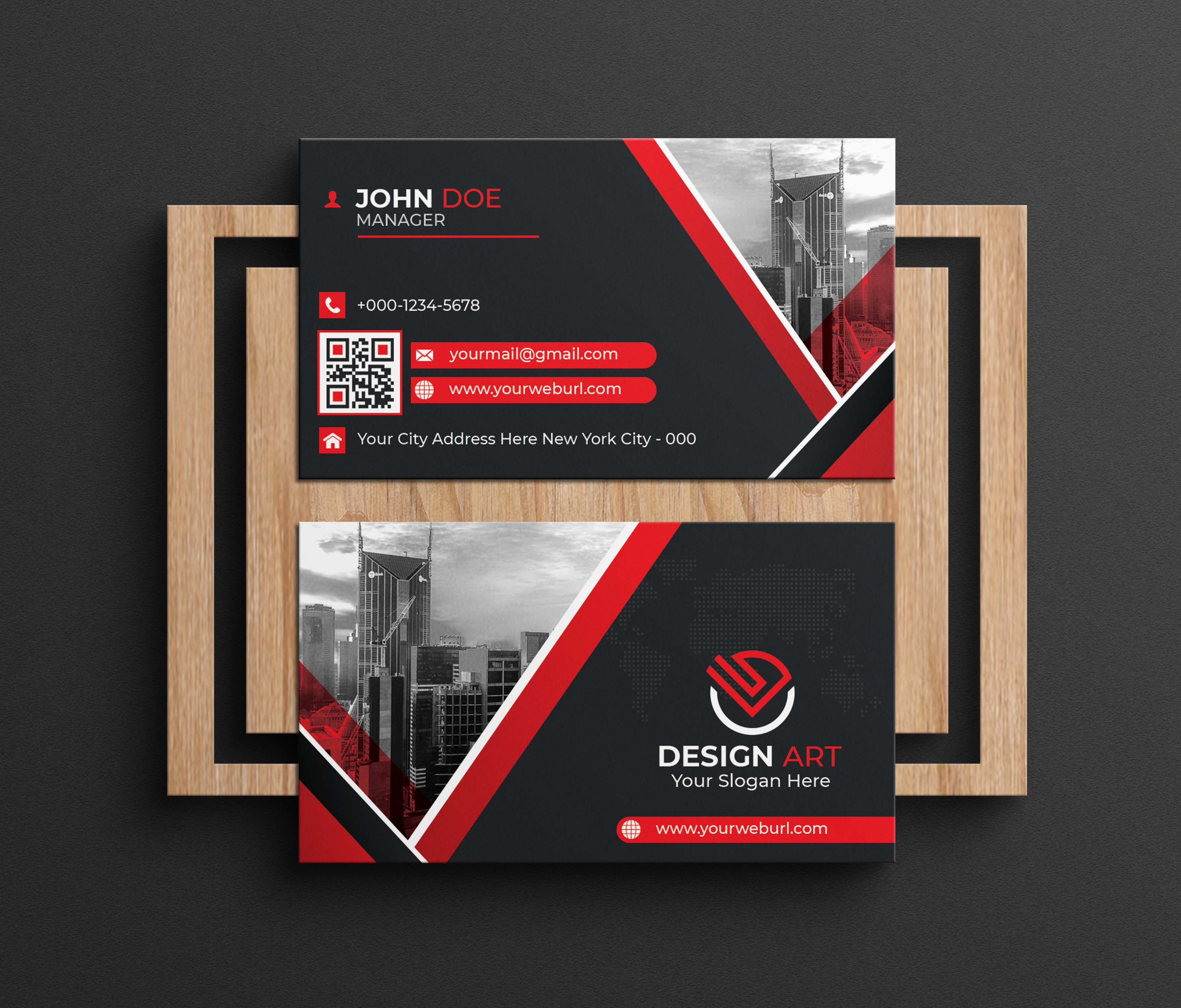 Black and red business card with a picture of a city.