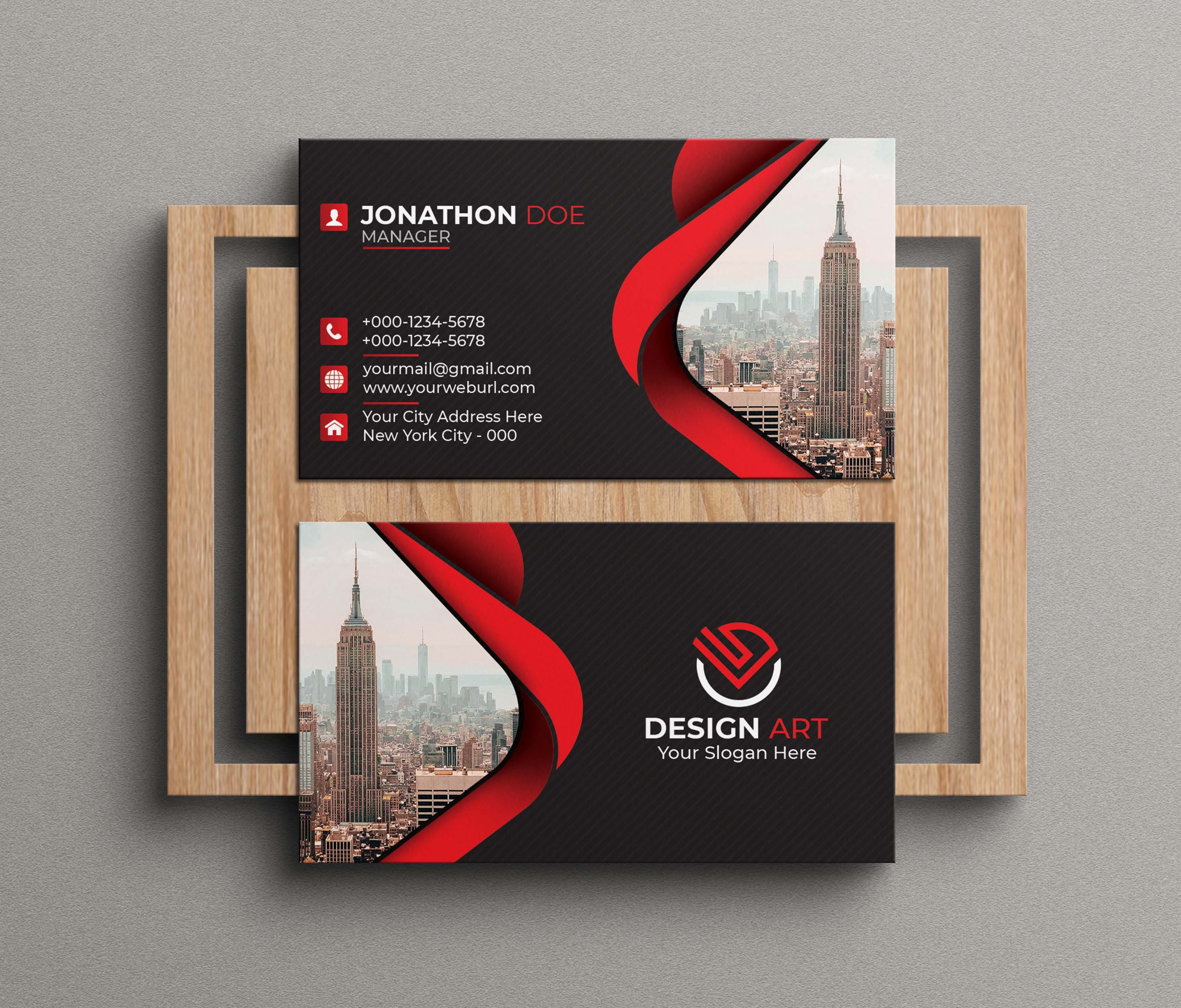 Two business cards with a red and black design.