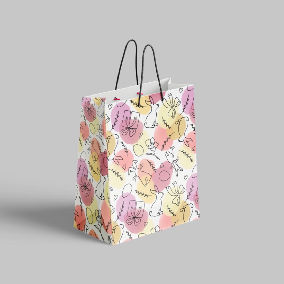 Shopping bag with a flower pattern on it.