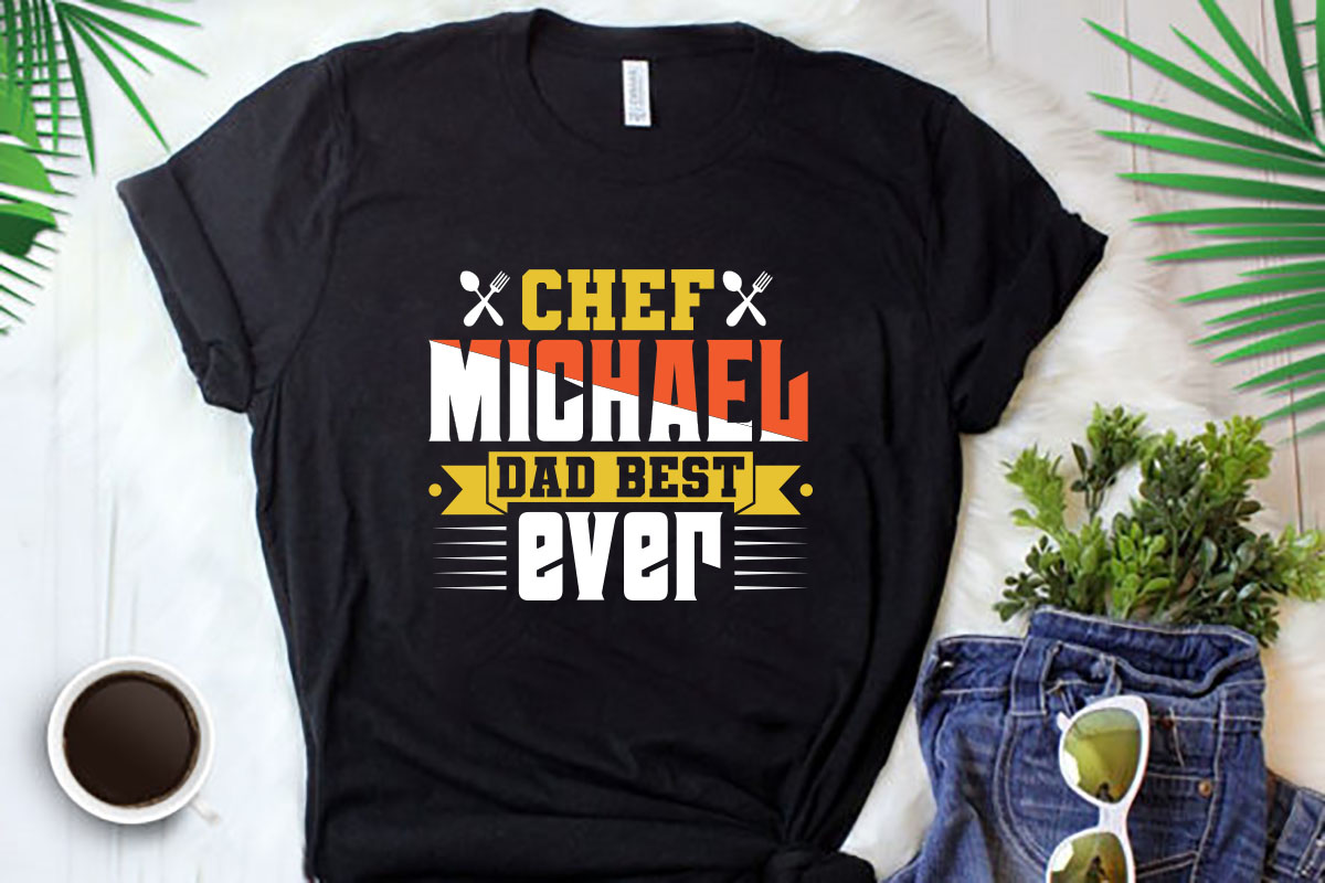 Black shirt that says chef michael dad best ever.
