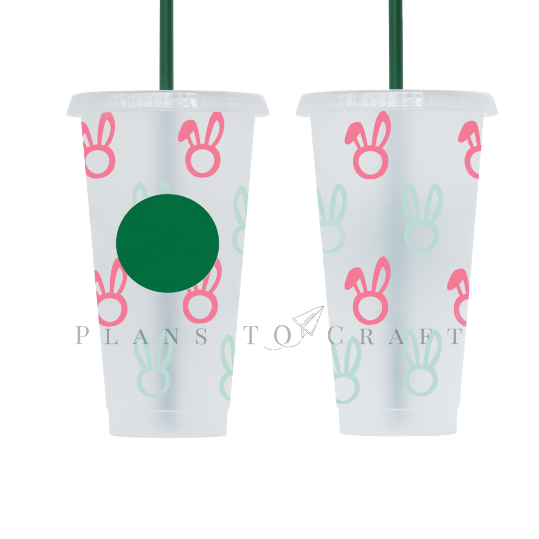 Two plastic cups with green straws and pink bunny ears on them.